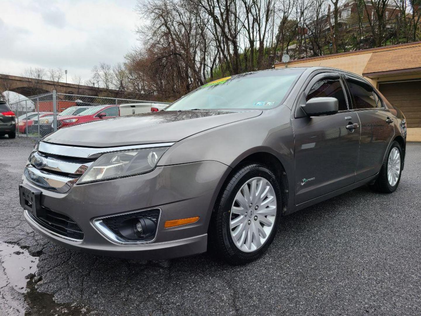 2010 GRAY FORD FUSION HYBRID (3FADP0L35AR) with an 2.5L engine, Continuously Variable transmission, located at 117 North Cameron Street, Harrisburg, PA, 17101, (717) 963-8962, 40.266762, -76.875259 - WE FINANCE!!! Good Credit/ Bad Credit/ No Credit - ALL Trade-Ins Welcomed!!! ***Guaranteed Credit Approval*** APPLY ONLINE or CALL us TODAY ;) Internet Prices and Marketplace Prices are SPECIAL discounted ***CASH DEALS*** Retail Prices are higher. Please call us to discuss your cash and finan - Photo#0