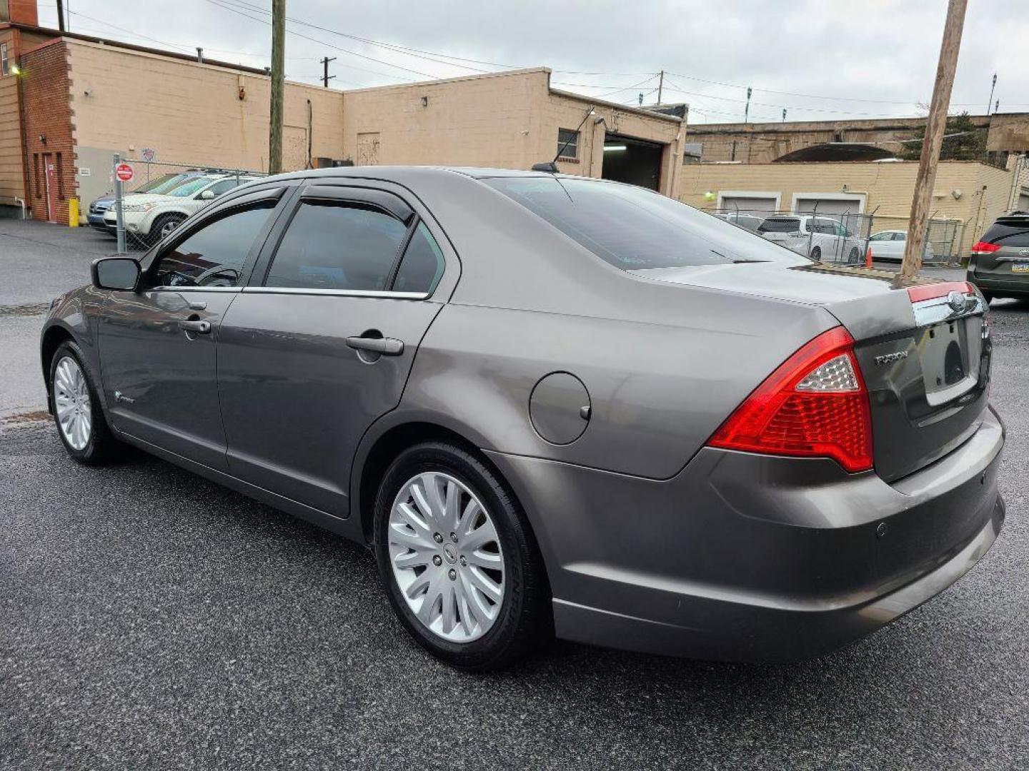 2010 GRAY FORD FUSION HYBRID (3FADP0L35AR) with an 2.5L engine, Continuously Variable transmission, located at 117 North Cameron Street, Harrisburg, PA, 17101, (717) 963-8962, 40.266762, -76.875259 - WE FINANCE!!! Good Credit/ Bad Credit/ No Credit - ALL Trade-Ins Welcomed!!! ***Guaranteed Credit Approval*** APPLY ONLINE or CALL us TODAY ;) Internet Prices and Marketplace Prices are SPECIAL discounted ***CASH DEALS*** Retail Prices are higher. Please call us to discuss your cash and finan - Photo#2