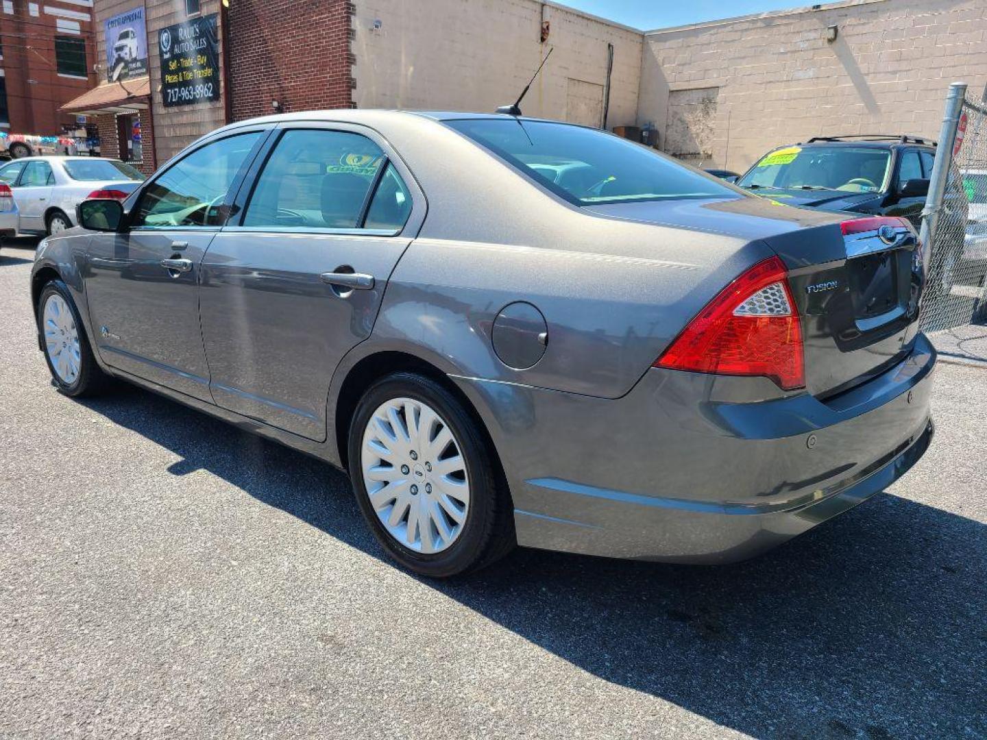 2010 GRAY FORD FUSION HYBRID (3FADP0L37AR) with an 2.5L engine, Continuously Variable transmission, located at 117 North Cameron Street, Harrisburg, PA, 17101, (717) 963-8962, 40.266762, -76.875259 - WE FINANCE!!! Good Credit/ Bad Credit/ No Credit - ALL Trade-Ins Welcomed!!! ***Guaranteed Credit Approval*** APPLY ONLINE or CALL us TODAY ;) Internet Prices and Marketplace Prices are SPECIAL discounted ***CASH DEALS*** Retail Prices are higher. Please call us to discuss your cash and finan - Photo#2