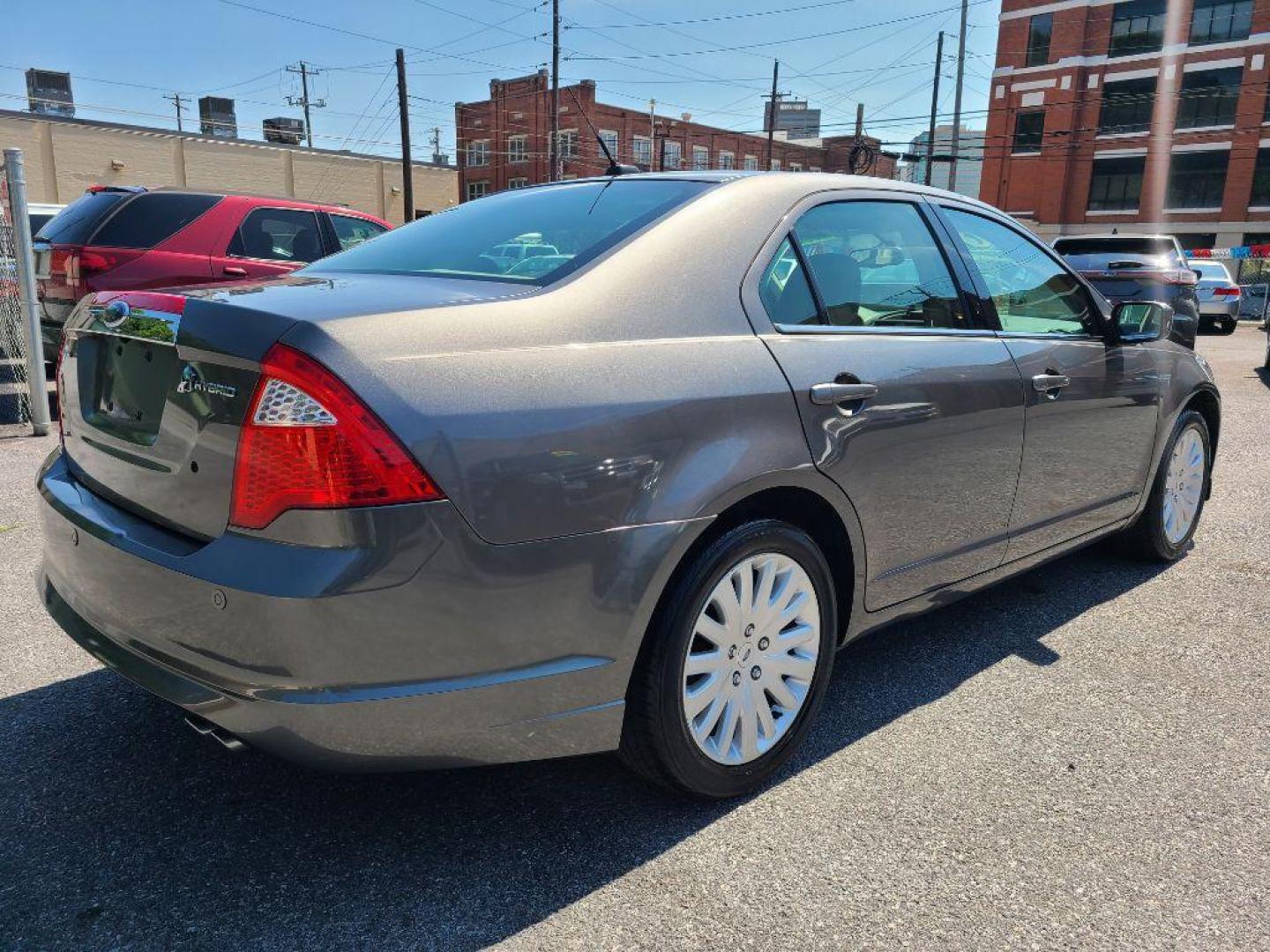 2010 GRAY FORD FUSION HYBRID (3FADP0L37AR) with an 2.5L engine, Continuously Variable transmission, located at 117 North Cameron Street, Harrisburg, PA, 17101, (717) 963-8962, 40.266762, -76.875259 - WE FINANCE!!! Good Credit/ Bad Credit/ No Credit - ALL Trade-Ins Welcomed!!! ***Guaranteed Credit Approval*** APPLY ONLINE or CALL us TODAY ;) Internet Prices and Marketplace Prices are SPECIAL discounted ***CASH DEALS*** Retail Prices are higher. Please call us to discuss your cash and finan - Photo#4