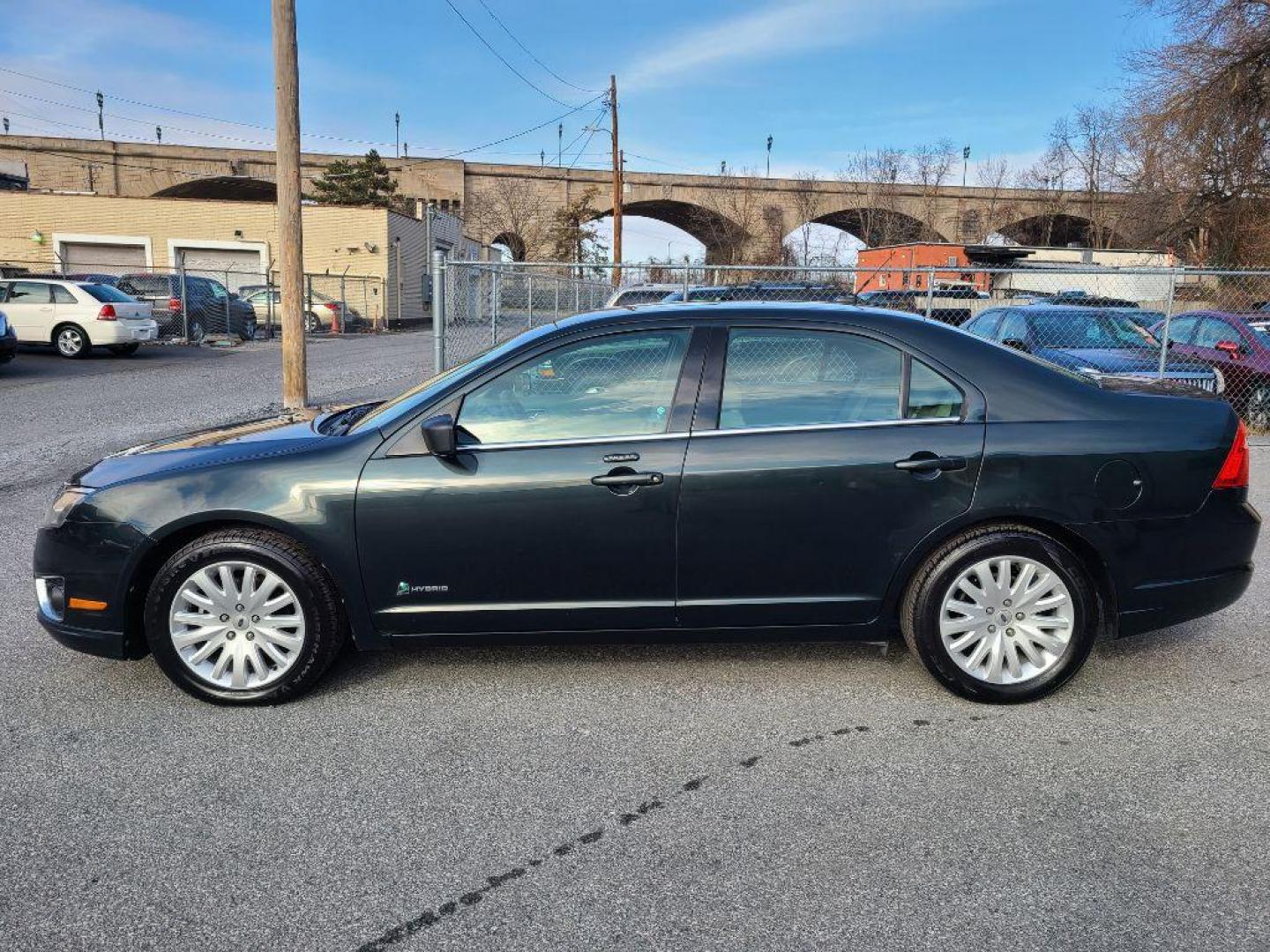 2010 GREEN FORD FUSION HYBRID (3FADP0L37AR) with an 2.5L engine, Continuously Variable transmission, located at 7981 Paxton Street, Harrisburg, PA, 17111, (717) 561-2926, 40.261490, -76.749229 - WE FINANCE!!! Good Credit/ Bad Credit/ No Credit - ALL Trade-Ins Welcomed!!! ***Guaranteed Credit Approval*** APPLY ONLINE or CALL us TODAY ;) Internet Prices and Marketplace Prices are SPECIAL discounted ***CASH DEALS*** Retail Prices are higher. Please call us to discuss your cash and finan - Photo#1