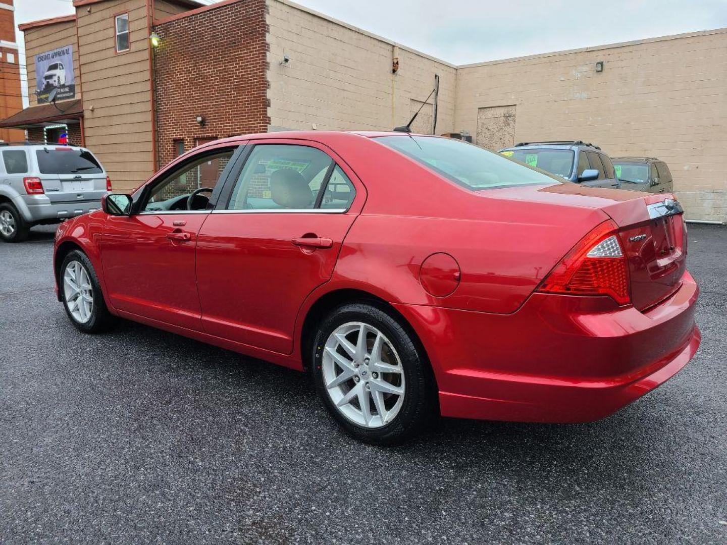 2010 RED FORD FUSION SEL (3FAHP0JAXAR) with an 2.5L engine, Automatic transmission, located at 117 North Cameron Street, Harrisburg, PA, 17101, (717) 963-8962, 40.266762, -76.875259 - WE FINANCE!!! Good Credit/ Bad Credit/ No Credit - ALL Trade-Ins Welcomed!!! ***Guaranteed Credit Approval*** APPLY ONLINE or CALL us TODAY ;) Internet Prices and Marketplace Prices are SPECIAL discounted ***CASH DEALS*** Retail Prices are higher. Please call us to discuss your cash and finan - Photo#2