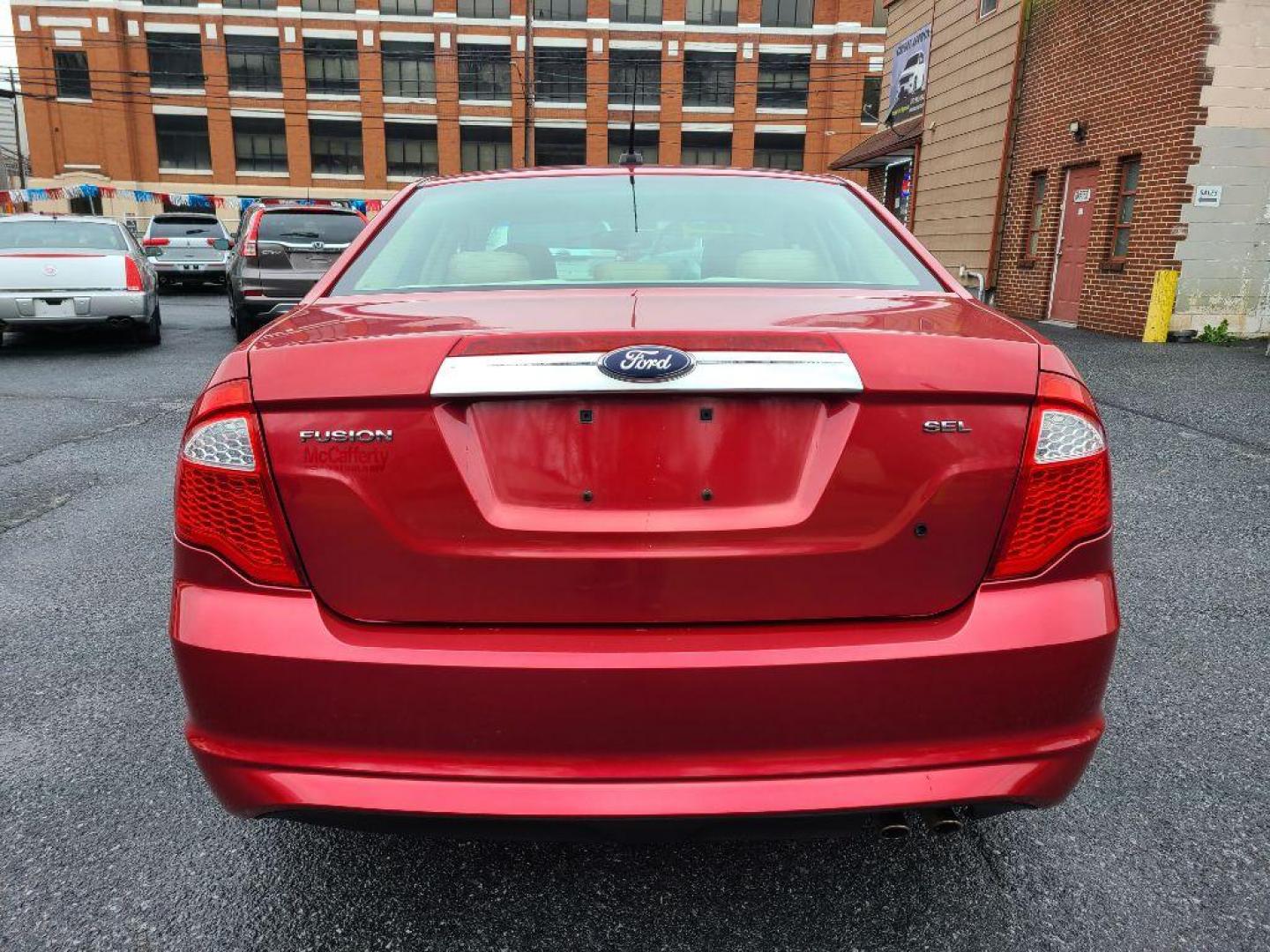 2010 RED FORD FUSION SEL (3FAHP0JAXAR) with an 2.5L engine, Automatic transmission, located at 117 North Cameron Street, Harrisburg, PA, 17101, (717) 963-8962, 40.266762, -76.875259 - WE FINANCE!!! Good Credit/ Bad Credit/ No Credit - ALL Trade-Ins Welcomed!!! ***Guaranteed Credit Approval*** APPLY ONLINE or CALL us TODAY ;) Internet Prices and Marketplace Prices are SPECIAL discounted ***CASH DEALS*** Retail Prices are higher. Please call us to discuss your cash and finan - Photo#3