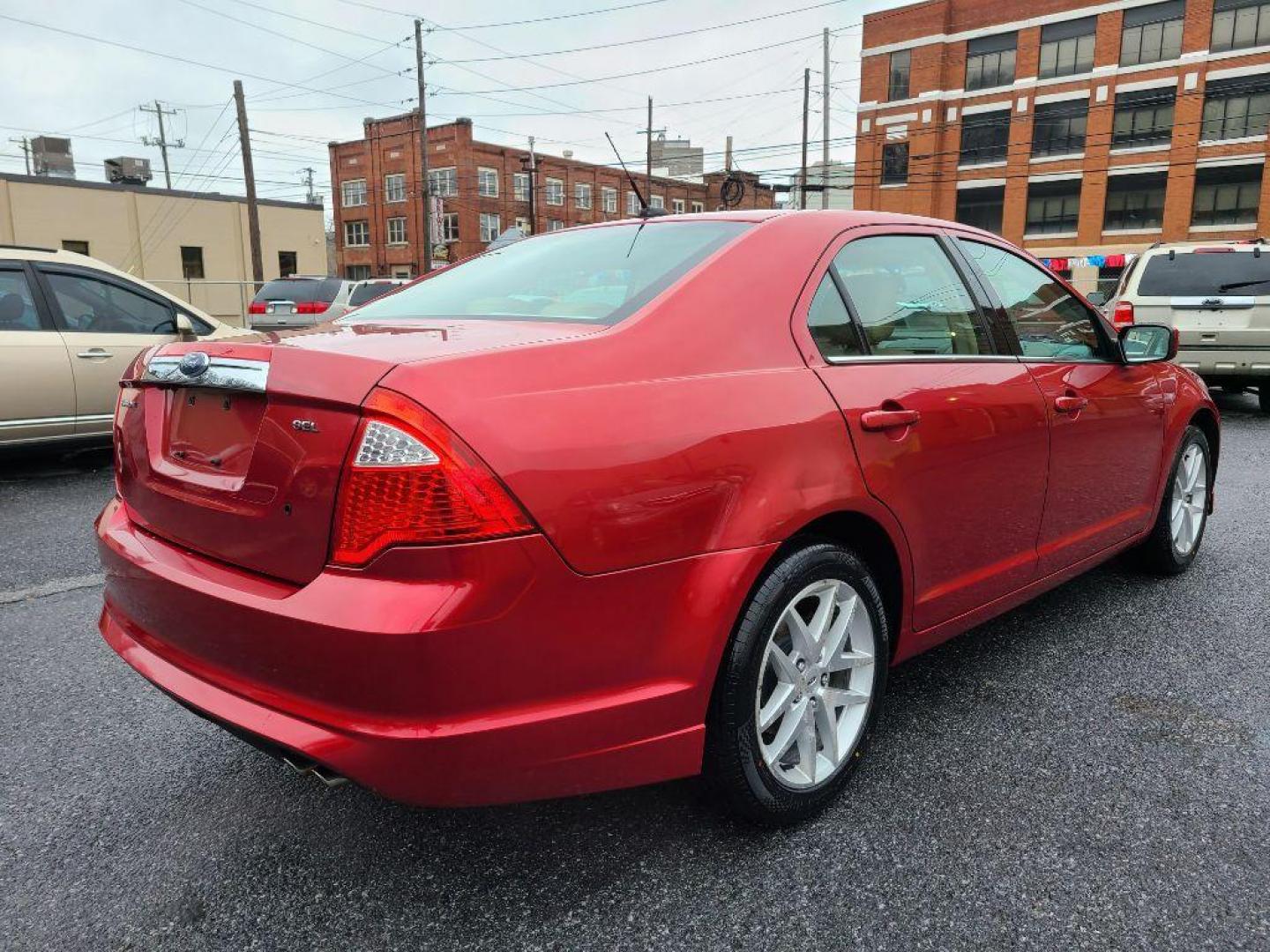 2010 RED FORD FUSION SEL (3FAHP0JAXAR) with an 2.5L engine, Automatic transmission, located at 117 North Cameron Street, Harrisburg, PA, 17101, (717) 963-8962, 40.266762, -76.875259 - WE FINANCE!!! Good Credit/ Bad Credit/ No Credit - ALL Trade-Ins Welcomed!!! ***Guaranteed Credit Approval*** APPLY ONLINE or CALL us TODAY ;) Internet Prices and Marketplace Prices are SPECIAL discounted ***CASH DEALS*** Retail Prices are higher. Please call us to discuss your cash and finan - Photo#4