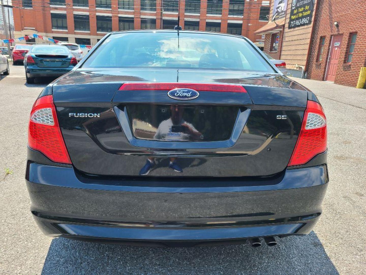 2010 BLACK FORD FUSION SE (3FAHP0HA8AR) with an 2.5L engine, 6-Speed Manual transmission, located at 7981 Paxton Street, Harrisburg, PA, 17111, (717) 561-2926, 40.261490, -76.749229 - WE FINANCE!!! Good Credit/ Bad Credit/ No Credit - ALL Trade-Ins Welcomed!!! ***Guaranteed Credit Approval*** APPLY ONLINE or CALL us TODAY ;) Internet Prices and Marketplace Prices are SPECIAL discounted ***CASH DEALS*** Retail Prices are higher. Please call us to discuss your cash and finan - Photo#3