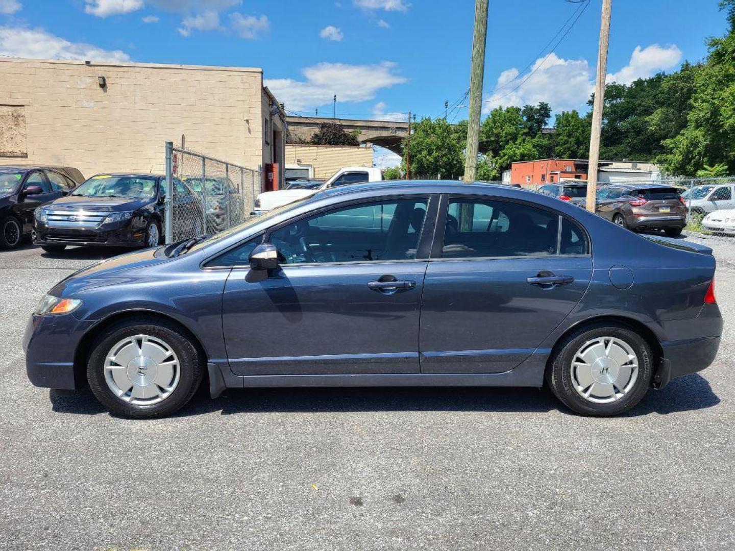 2010 GRAY HONDA CIVIC HYBRID (JHMFA3F2XAS) with an 1.3L engine, Continuously Variable transmission, located at 117 North Cameron Street, Harrisburg, PA, 17101, (717) 963-8962, 40.266762, -76.875259 - WE FINANCE!!! Good Credit/ Bad Credit/ No Credit - ALL Trade-Ins Welcomed!!! ***Guaranteed Credit Approval*** APPLY ONLINE or CALL us TODAY ;) Internet Prices and Marketplace Prices are SPECIAL discounted ***CASH DEALS*** Retail Prices are higher. Please call us to discuss your cash and finan - Photo#1