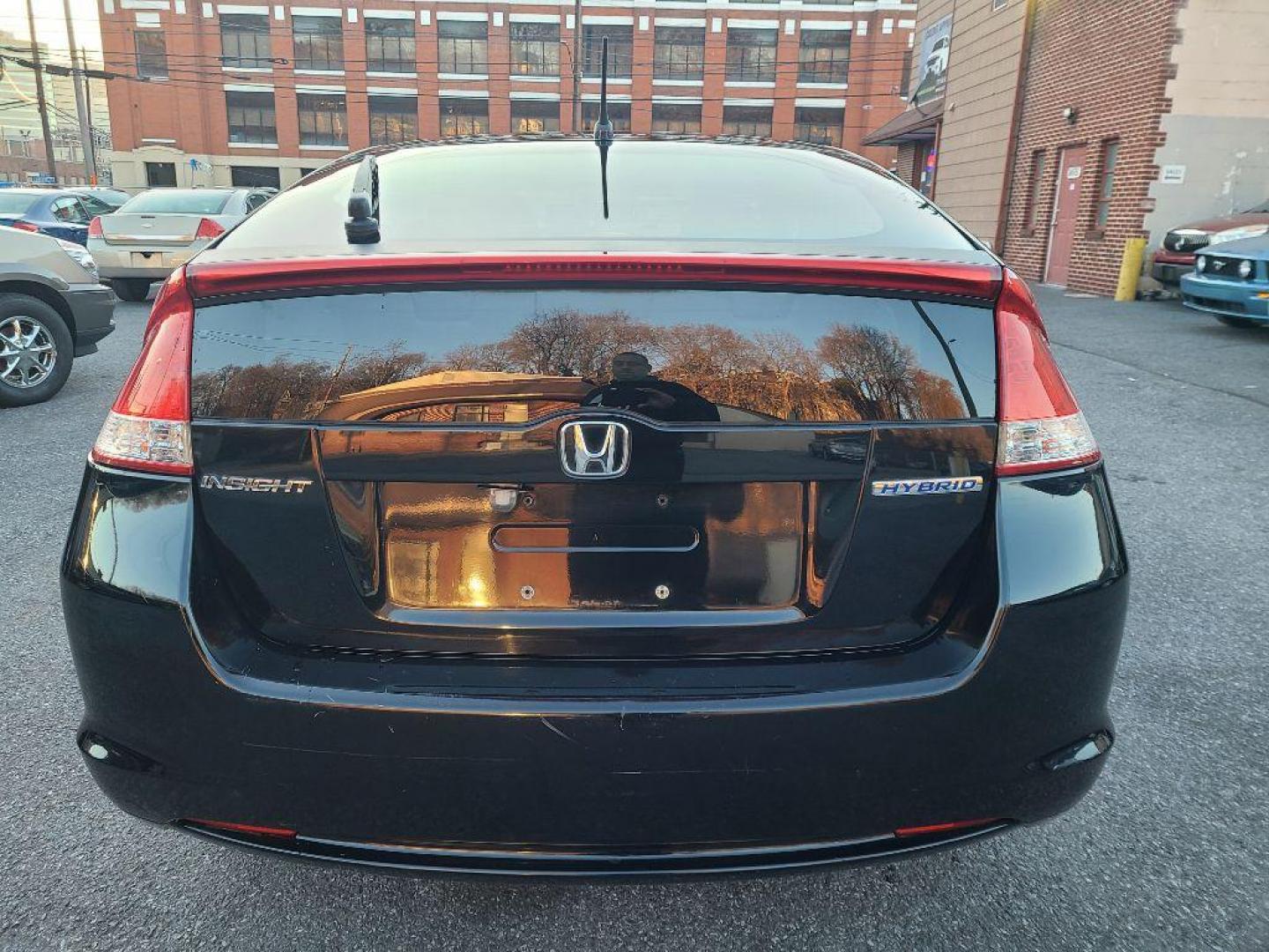 2010 BLACK HONDA INSIGHT EX (JHMZE2H73AS) with an 1.3L engine, Continuously Variable transmission, located at 7981 Paxton Street, Harrisburg, PA, 17111, (717) 561-2926, 40.261490, -76.749229 - WE FINANCE!!! Good Credit/ Bad Credit/ No Credit - ALL Trade-Ins Welcomed!!! ***Guaranteed Credit Approval*** APPLY ONLINE or CALL us TODAY ;) Internet Prices and Marketplace Prices are SPECIAL discounted ***CASH DEALS*** Retail Prices are higher. Please call us to discuss your cash and finan - Photo#3