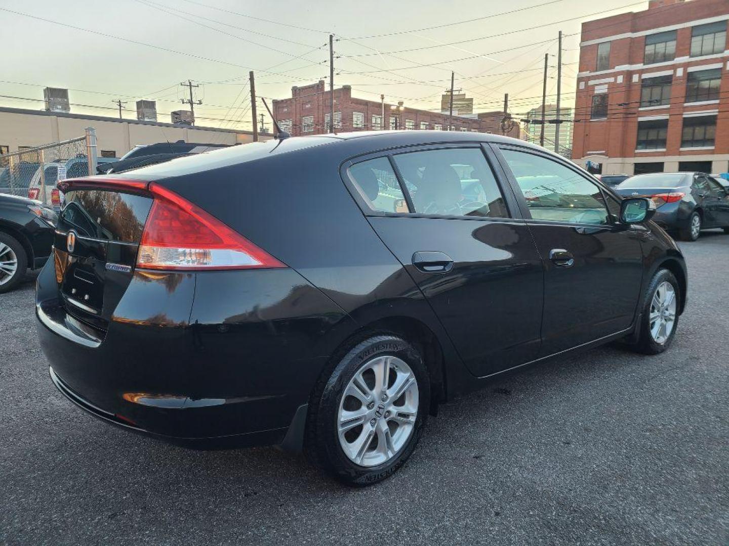 2010 BLACK HONDA INSIGHT EX (JHMZE2H73AS) with an 1.3L engine, Continuously Variable transmission, located at 7981 Paxton Street, Harrisburg, PA, 17111, (717) 561-2926, 40.261490, -76.749229 - WE FINANCE!!! Good Credit/ Bad Credit/ No Credit - ALL Trade-Ins Welcomed!!! ***Guaranteed Credit Approval*** APPLY ONLINE or CALL us TODAY ;) Internet Prices and Marketplace Prices are SPECIAL discounted ***CASH DEALS*** Retail Prices are higher. Please call us to discuss your cash and finan - Photo#4