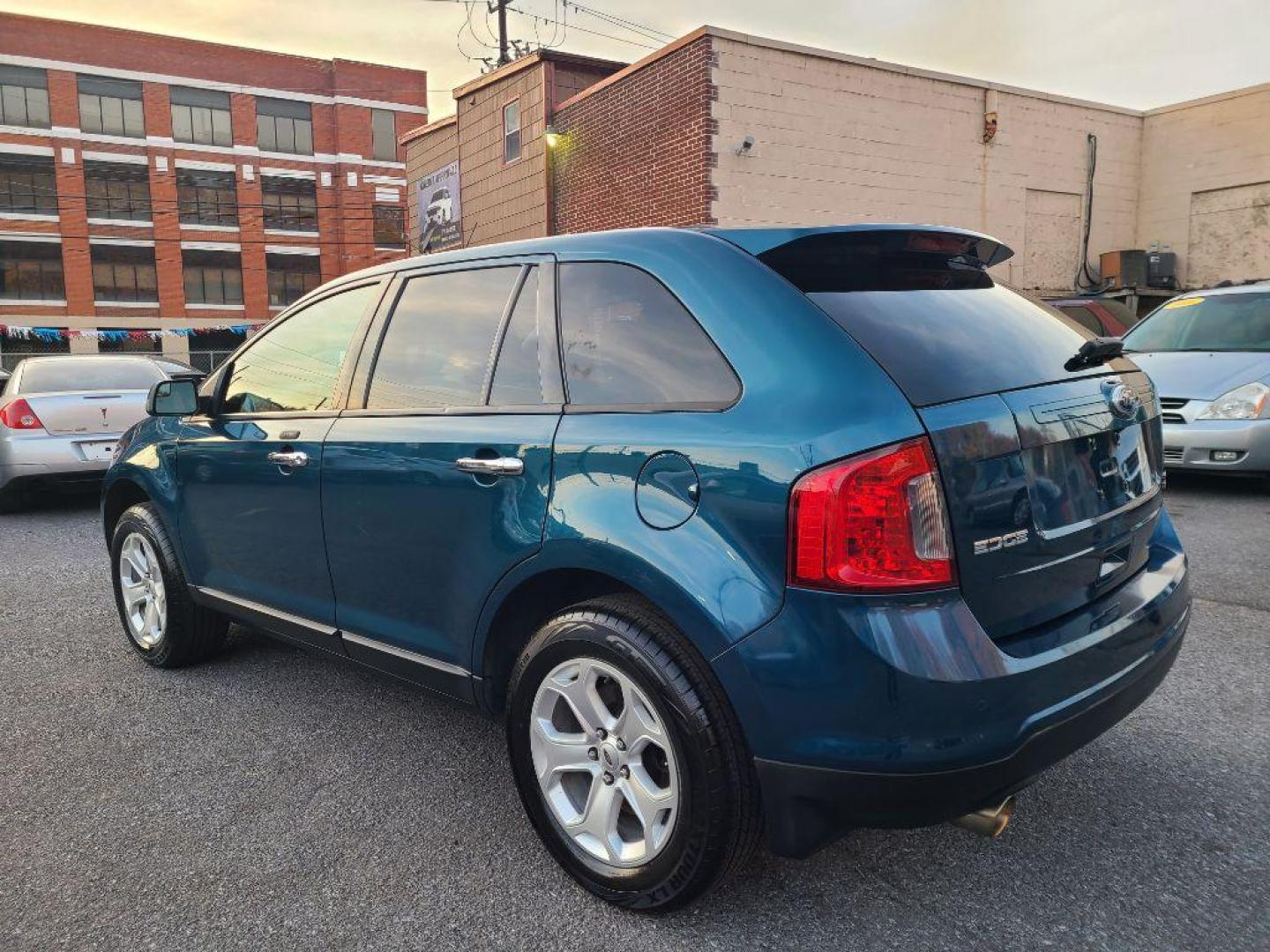 2011 GREEN FORD EDGE SEL (2FMDK4JC8BB) with an 3.5L engine, Automatic transmission, located at 117 North Cameron Street, Harrisburg, PA, 17101, (717) 963-8962, 40.266762, -76.875259 - WE FINANCE!!! Good Credit/ Bad Credit/ No Credit - ALL Trade-Ins Welcomed!!! ***Guaranteed Credit Approval*** APPLY ONLINE or CALL us TODAY ;) Internet Prices and Marketplace Prices are SPECIAL discounted ***CASH DEALS*** Retail Prices are higher. Please call us to discuss your cash and finan - Photo#2