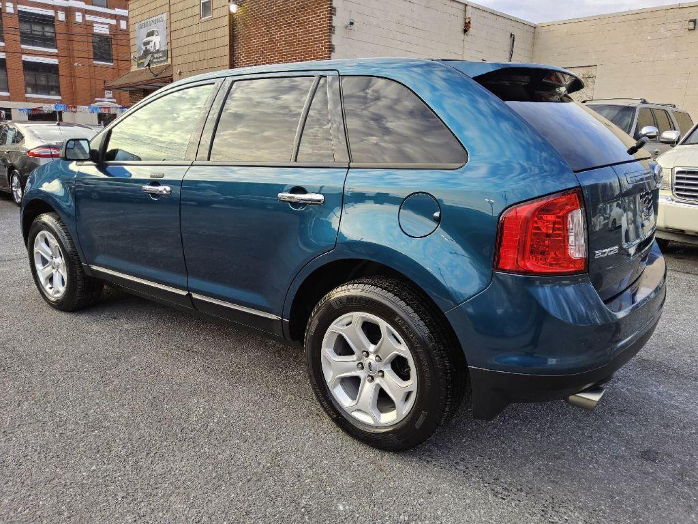 2011 GREEN FORD EDGE SEL (2FMDK4JC9BB) with an 3.5L engine, Automatic transmission, located at 117 North Cameron Street, Harrisburg, PA, 17101, (717) 963-8962, 40.266762, -76.875259 - WE FINANCE!!! Good Credit/ Bad Credit/ No Credit - ALL Trade-Ins Welcomed!!! ***Guaranteed Credit Approval*** APPLY ONLINE or CALL us TODAY ;) Internet Prices and Marketplace Prices are SPECIAL discounted ***CASH DEALS*** Retail Prices are higher. Please call us to discuss your cash and finan - Photo#2