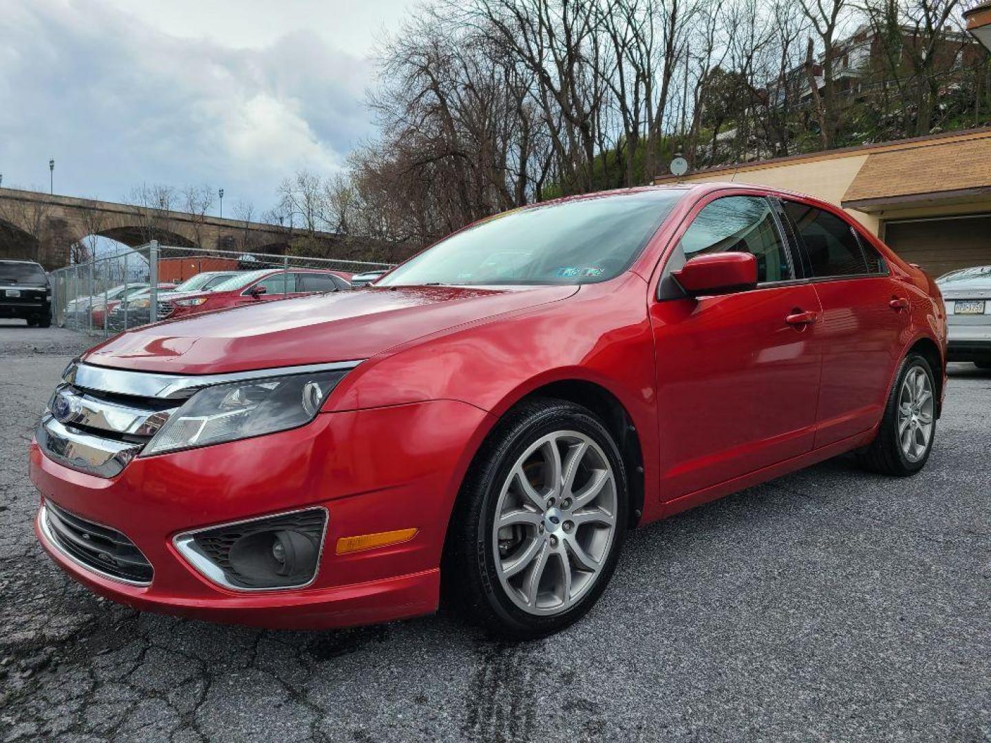 2011 RED FORD FUSION SE (3FAHP0HA1BR) with an 2.5L engine, Automatic transmission, located at 117 North Cameron Street, Harrisburg, PA, 17101, (717) 963-8962, 40.266762, -76.875259 - WE FINANCE!!! Good Credit/ Bad Credit/ No Credit - ALL Trade-Ins Welcomed!!! ***Guaranteed Credit Approval*** APPLY ONLINE or CALL us TODAY ;) Internet Prices and Marketplace Prices are SPECIAL discounted ***CASH DEALS*** Retail Prices are higher. Please call us to discuss your cash and finan - Photo#0