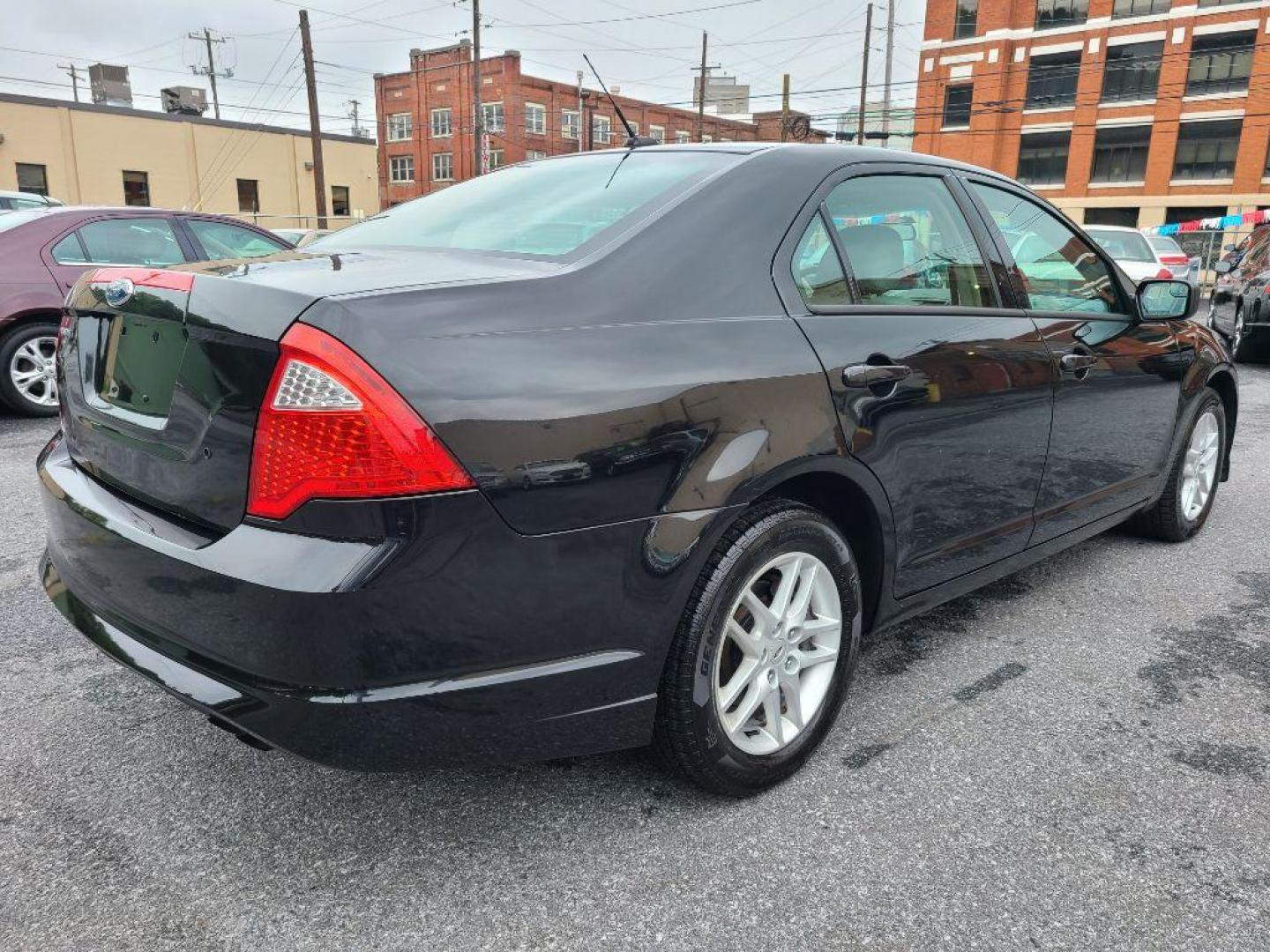 2011 BLACK FORD FUSION S (3FAHP0GAXBR) with an 2.5L engine, Automatic transmission, located at 117 North Cameron Street, Harrisburg, PA, 17101, (717) 963-8962, 40.266762, -76.875259 - WE FINANCE!!! Good Credit/ Bad Credit/ No Credit - ALL Trade-Ins Welcomed!!! ***Guaranteed Credit Approval*** APPLY ONLINE or CALL us TODAY ;) Internet Prices and Marketplace Prices are SPECIAL discounted ***CASH DEALS*** Retail Prices are higher. Please call us to discuss your cash and finan - Photo#4