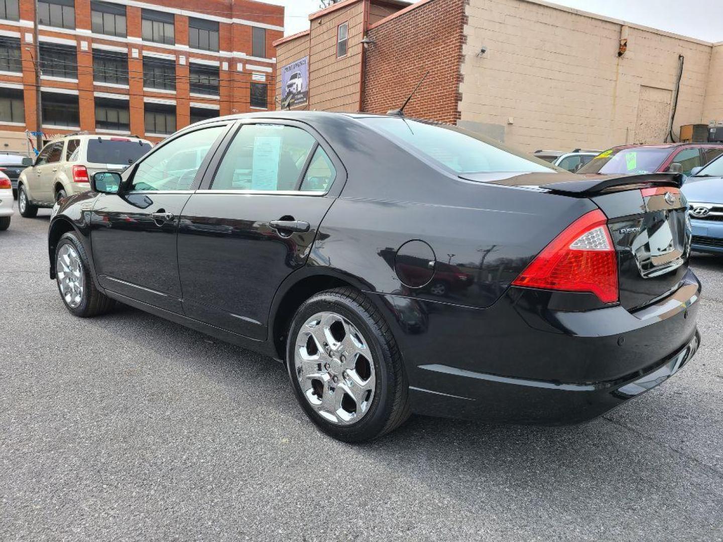 2011 BLACK FORD FUSION SE (3FAHP0HA4BR) with an 2.5L engine, Automatic transmission, located at 117 North Cameron Street, Harrisburg, PA, 17101, (717) 963-8962, 40.266762, -76.875259 - WE FINANCE!!! Good Credit/ Bad Credit/ No Credit - ALL Trade-Ins Welcomed!!! ***Guaranteed Credit Approval*** APPLY ONLINE or CALL us TODAY ;) Internet Prices and Marketplace Prices are SPECIAL discounted ***CASH DEALS*** Retail Prices are higher. Please call us to discuss your cash and finan - Photo#2