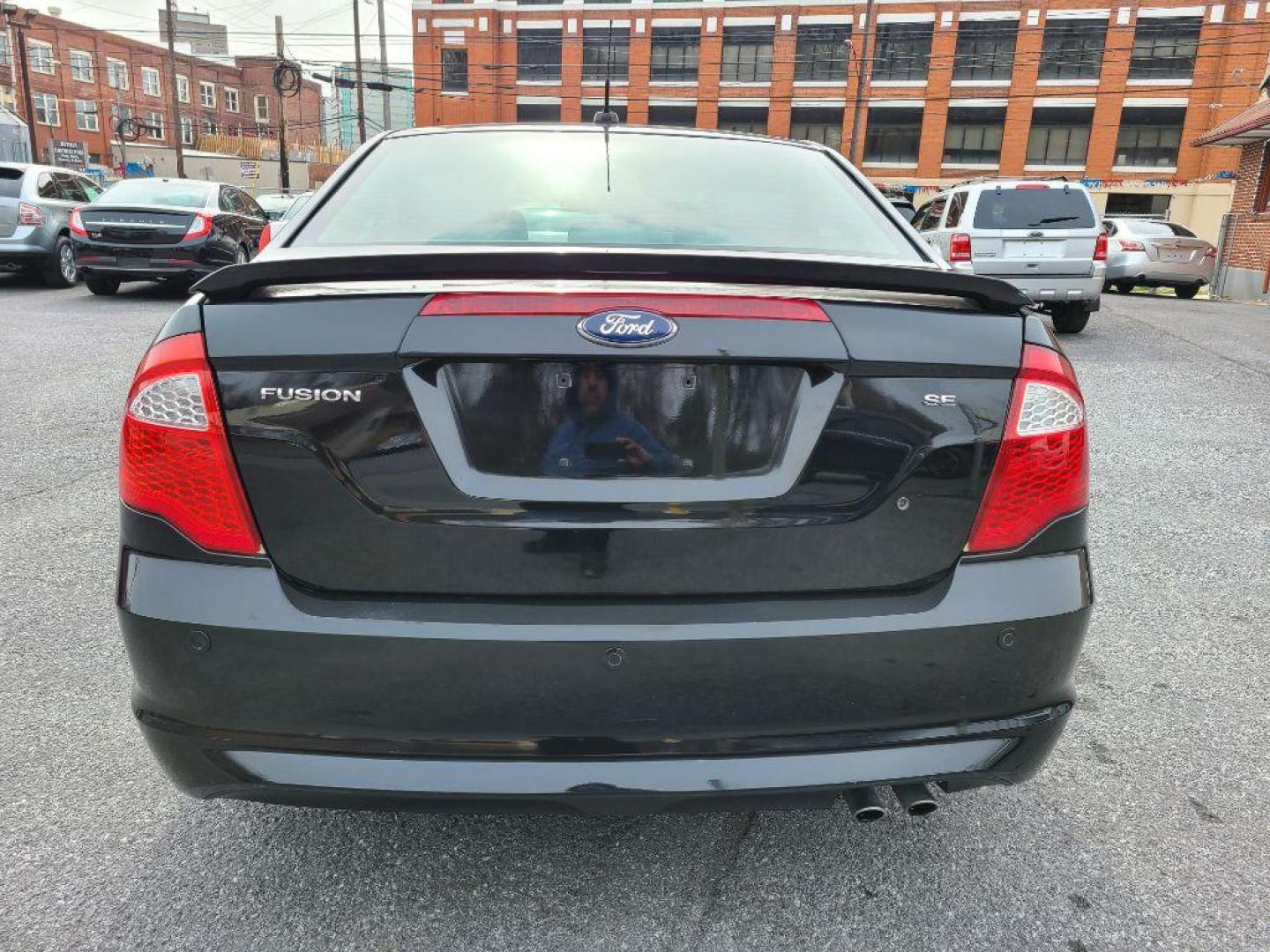 2011 BLACK FORD FUSION SE (3FAHP0HA4BR) with an 2.5L engine, Automatic transmission, located at 117 North Cameron Street, Harrisburg, PA, 17101, (717) 963-8962, 40.266762, -76.875259 - WE FINANCE!!! Good Credit/ Bad Credit/ No Credit - ALL Trade-Ins Welcomed!!! ***Guaranteed Credit Approval*** APPLY ONLINE or CALL us TODAY ;) Internet Prices and Marketplace Prices are SPECIAL discounted ***CASH DEALS*** Retail Prices are higher. Please call us to discuss your cash and finan - Photo#3