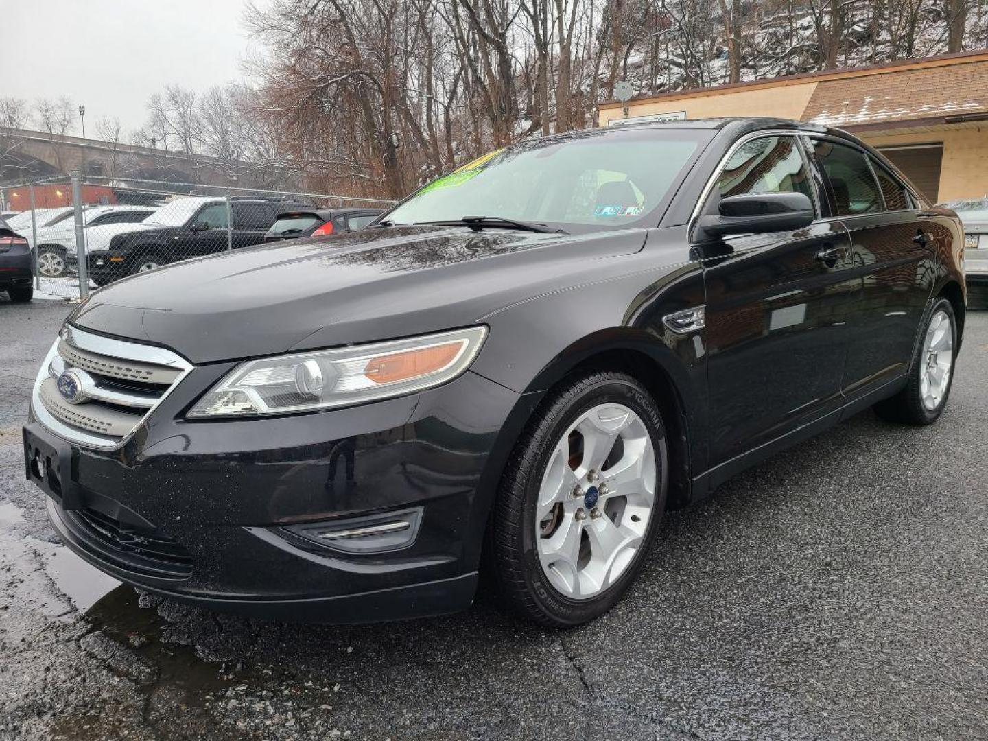 2011 BLACK FORD TAURUS SEL (1FAHP2EW6BG) with an 3.5L engine, Automatic transmission, located at 117 North Cameron Street, Harrisburg, PA, 17101, (717) 963-8962, 40.266762, -76.875259 - WE FINANCE!!! Good Credit/ Bad Credit/ No Credit - ALL Trade-Ins Welcomed!!! ***Guaranteed Credit Approval*** APPLY ONLINE or CALL us TODAY ;) Internet Prices and Marketplace Prices are SPECIAL discounted ***CASH DEALS*** Retail Prices are higher. Please call us to discuss your cash and finan - Photo#0