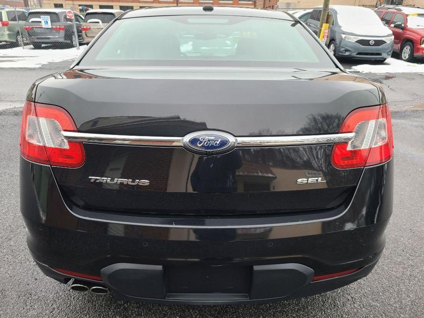 2011 BLACK FORD TAURUS SEL (1FAHP2EW6BG) with an 3.5L engine, Automatic transmission, located at 117 North Cameron Street, Harrisburg, PA, 17101, (717) 963-8962, 40.266762, -76.875259 - WE FINANCE!!! Good Credit/ Bad Credit/ No Credit - ALL Trade-Ins Welcomed!!! ***Guaranteed Credit Approval*** APPLY ONLINE or CALL us TODAY ;) Internet Prices and Marketplace Prices are SPECIAL discounted ***CASH DEALS*** Retail Prices are higher. Please call us to discuss your cash and finan - Photo#3