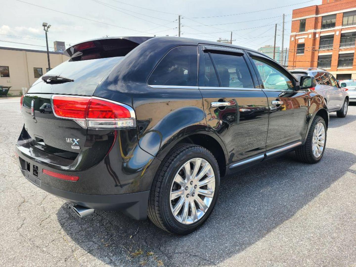 2011 BLACK LINCOLN MKX SUV (2LMDJ8JK9BB) with an 3.7L engine, Automatic transmission, located at 7981 Paxton Street, Harrisburg, PA, 17111, (717) 561-2926, 40.261490, -76.749229 - WE FINANCE!!! Good Credit/ Bad Credit/ No Credit - ALL Trade-Ins Welcomed!!! ***Guaranteed Credit Approval*** APPLY ONLINE or CALL us TODAY ;) Internet Prices and Marketplace Prices are SPECIAL discounted ***CASH DEALS*** Retail Prices are higher. Please call us to discuss your cash and finan - Photo#4