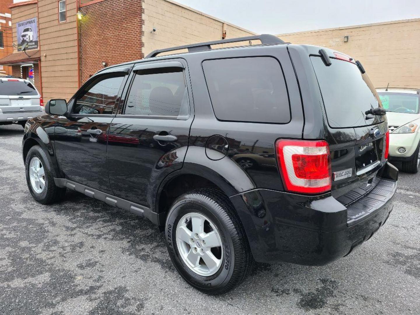 2012 BLACK FORD ESCAPE XLT (1FMCU9D74CK) with an 2.5L engine, Automatic transmission, located at 117 North Cameron Street, Harrisburg, PA, 17101, (717) 963-8962, 40.266762, -76.875259 - WE FINANCE!!! Good Credit/ Bad Credit/ No Credit - ALL Trade-Ins Welcomed!!! ***Guaranteed Credit Approval*** APPLY ONLINE or CALL us TODAY ;) Internet Prices and Marketplace Prices are SPECIAL discounted ***CASH DEALS*** Retail Prices are higher. Please call us to discuss your cash and finan - Photo#2