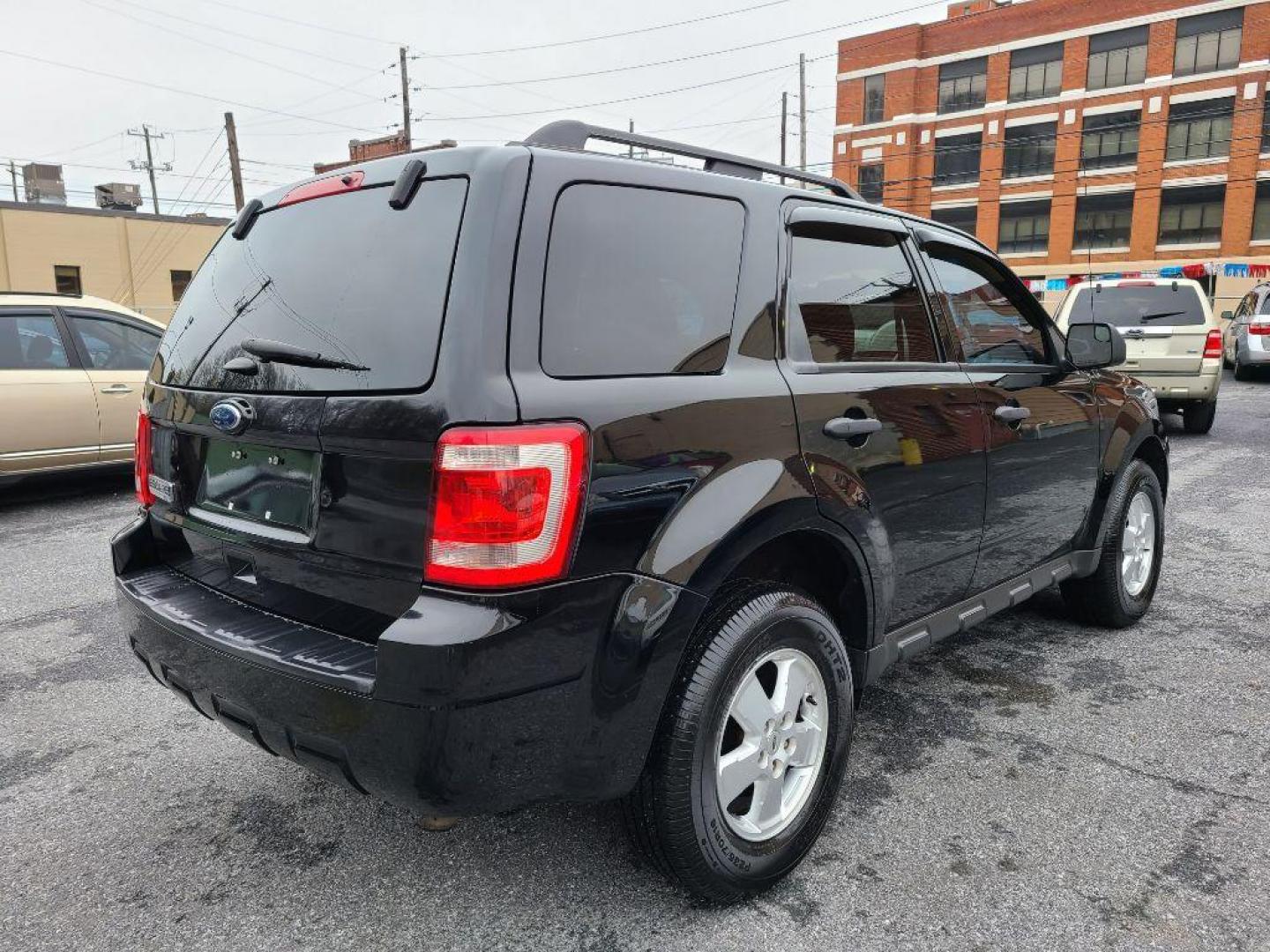 2012 BLACK FORD ESCAPE XLT (1FMCU9D74CK) with an 2.5L engine, Automatic transmission, located at 117 North Cameron Street, Harrisburg, PA, 17101, (717) 963-8962, 40.266762, -76.875259 - WE FINANCE!!! Good Credit/ Bad Credit/ No Credit - ALL Trade-Ins Welcomed!!! ***Guaranteed Credit Approval*** APPLY ONLINE or CALL us TODAY ;) Internet Prices and Marketplace Prices are SPECIAL discounted ***CASH DEALS*** Retail Prices are higher. Please call us to discuss your cash and finan - Photo#4