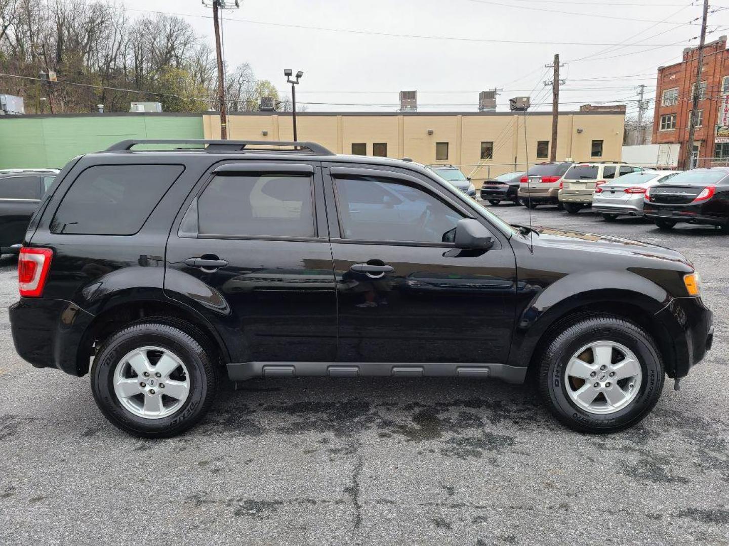 2012 BLACK FORD ESCAPE XLT (1FMCU9D74CK) with an 2.5L engine, Automatic transmission, located at 117 North Cameron Street, Harrisburg, PA, 17101, (717) 963-8962, 40.266762, -76.875259 - WE FINANCE!!! Good Credit/ Bad Credit/ No Credit - ALL Trade-Ins Welcomed!!! ***Guaranteed Credit Approval*** APPLY ONLINE or CALL us TODAY ;) Internet Prices and Marketplace Prices are SPECIAL discounted ***CASH DEALS*** Retail Prices are higher. Please call us to discuss your cash and finan - Photo#5