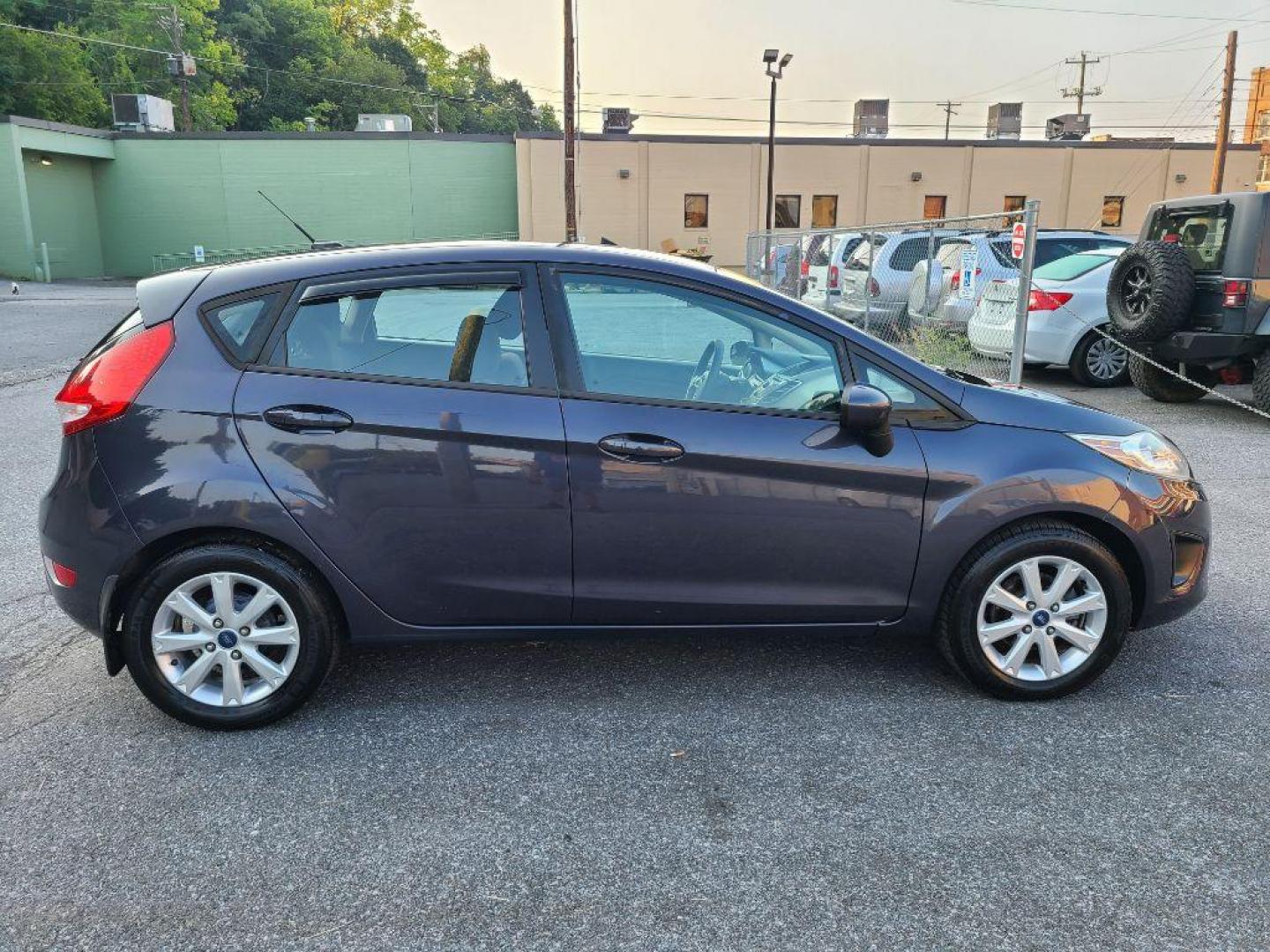 2012 GRAY FORD FIESTA SE (3FADP4EJ0CM) with an 1.6L engine, Automatic transmission, located at 117 North Cameron Street, Harrisburg, PA, 17101, (717) 963-8962, 40.266762, -76.875259 - WE FINANCE!!! Good Credit/ Bad Credit/ No Credit - ALL Trade-Ins Welcomed!!! ***Guaranteed Credit Approval*** APPLY ONLINE or CALL us TODAY ;) Internet Prices and Marketplace Prices are SPECIAL discounted ***CASH DEALS*** Retail Prices are higher. Please call us to discuss your cash and finan - Photo#5