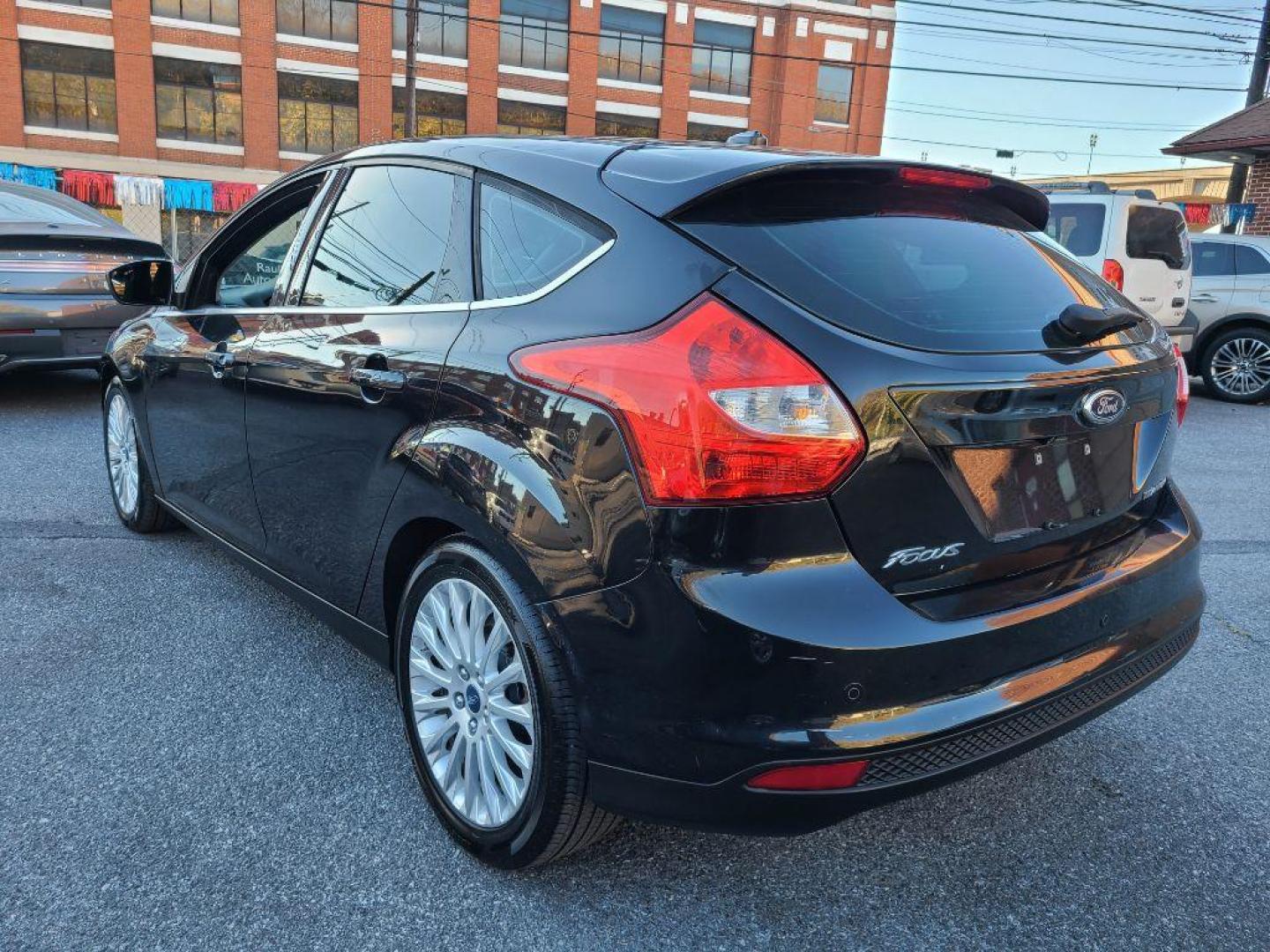 2012 BLACK FORD FOCUS TITANIUM (1FAHP3N27CL) with an 2.0L engine, Automatic transmission, located at 117 North Cameron Street, Harrisburg, PA, 17101, (717) 963-8962, 40.266762, -76.875259 - WE FINANCE!!! Good Credit/ Bad Credit/ No Credit - ALL Trade-Ins Welcomed!!! ***Guaranteed Credit Approval*** APPLY ONLINE or CALL us TODAY ;) Internet Prices and Marketplace Prices are SPECIAL discounted ***CASH DEALS*** Retail Prices are higher. Please call us to discuss your cash and finan - Photo#2