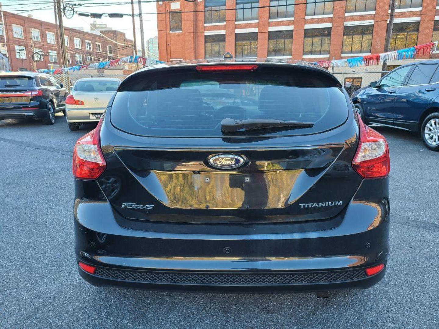 2012 BLACK FORD FOCUS TITANIUM (1FAHP3N27CL) with an 2.0L engine, Automatic transmission, located at 117 North Cameron Street, Harrisburg, PA, 17101, (717) 963-8962, 40.266762, -76.875259 - WE FINANCE!!! Good Credit/ Bad Credit/ No Credit - ALL Trade-Ins Welcomed!!! ***Guaranteed Credit Approval*** APPLY ONLINE or CALL us TODAY ;) Internet Prices and Marketplace Prices are SPECIAL discounted ***CASH DEALS*** Retail Prices are higher. Please call us to discuss your cash and finan - Photo#3