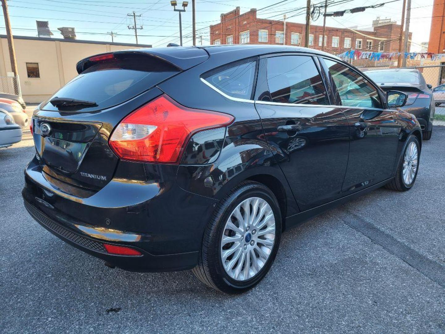 2012 BLACK FORD FOCUS TITANIUM (1FAHP3N27CL) with an 2.0L engine, Automatic transmission, located at 117 North Cameron Street, Harrisburg, PA, 17101, (717) 963-8962, 40.266762, -76.875259 - WE FINANCE!!! Good Credit/ Bad Credit/ No Credit - ALL Trade-Ins Welcomed!!! ***Guaranteed Credit Approval*** APPLY ONLINE or CALL us TODAY ;) Internet Prices and Marketplace Prices are SPECIAL discounted ***CASH DEALS*** Retail Prices are higher. Please call us to discuss your cash and finan - Photo#4