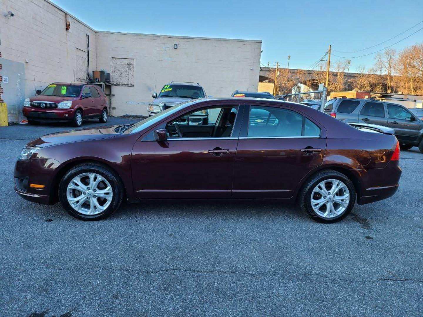 2012 BURGUN FORD FUSION SE (3FAHP0HA7CR) with an 2.5L engine, Automatic transmission, located at 117 North Cameron Street, Harrisburg, PA, 17101, (717) 963-8962, 40.266762, -76.875259 - WE FINANCE!!! Good Credit/ Bad Credit/ No Credit - ALL Trade-Ins Welcomed!!! ***Guaranteed Credit Approval*** APPLY ONLINE or CALL us TODAY ;) Internet Prices and Marketplace Prices are SPECIAL discounted ***CASH DEALS*** Retail Prices are higher. Please call us to discuss your cash and finan - Photo#1