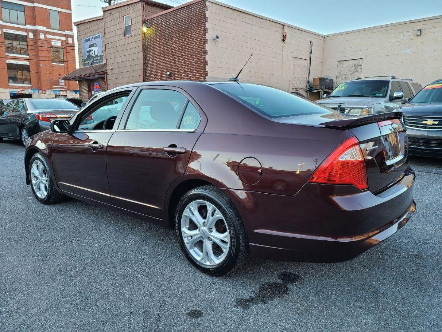 2012 BURGUN FORD FUSION SE (3FAHP0HA7CR) with an 2.5L engine, Automatic transmission, located at 117 North Cameron Street, Harrisburg, PA, 17101, (717) 963-8962, 40.266762, -76.875259 - WE FINANCE!!! Good Credit/ Bad Credit/ No Credit - ALL Trade-Ins Welcomed!!! ***Guaranteed Credit Approval*** APPLY ONLINE or CALL us TODAY ;) Internet Prices and Marketplace Prices are SPECIAL discounted ***CASH DEALS*** Retail Prices are higher. Please call us to discuss your cash and finan - Photo#2