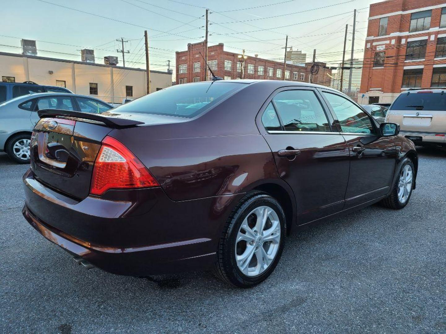 2012 BURGUN FORD FUSION SE (3FAHP0HA7CR) with an 2.5L engine, Automatic transmission, located at 117 North Cameron Street, Harrisburg, PA, 17101, (717) 963-8962, 40.266762, -76.875259 - WE FINANCE!!! Good Credit/ Bad Credit/ No Credit - ALL Trade-Ins Welcomed!!! ***Guaranteed Credit Approval*** APPLY ONLINE or CALL us TODAY ;) Internet Prices and Marketplace Prices are SPECIAL discounted ***CASH DEALS*** Retail Prices are higher. Please call us to discuss your cash and finan - Photo#4