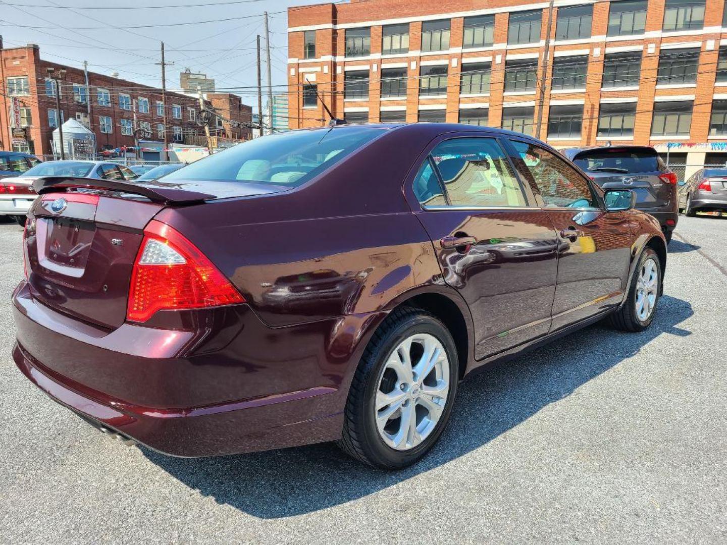 2012 BURGUN FORD FUSION SE (3FAHP0HA9CR) with an 2.5L engine, Automatic transmission, located at 7981 Paxton Street, Harrisburg, PA, 17111, (717) 561-2926, 40.261490, -76.749229 - WE FINANCE!!! Good Credit/ Bad Credit/ No Credit - ALL Trade-Ins Welcomed!!! ***Guaranteed Credit Approval*** APPLY ONLINE or CALL us TODAY ;) Internet Prices and Marketplace Prices are SPECIAL discounted ***CASH DEALS*** Retail Prices are higher. Please call us to discuss your cash and finan - Photo#4