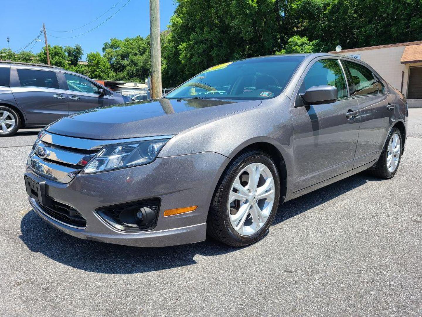 2012 GRAY FORD FUSION SE (3FAHP0HA0CR) with an 2.5L engine, Automatic transmission, located at 117 North Cameron Street, Harrisburg, PA, 17101, (717) 963-8962, 40.266762, -76.875259 - WE FINANCE!!! Good Credit/ Bad Credit/ No Credit - ALL Trade-Ins Welcomed!!! ***Guaranteed Credit Approval*** APPLY ONLINE or CALL us TODAY ;) Internet Prices and Marketplace Prices are SPECIAL discounted ***CASH DEALS*** Retail Prices are higher. Please call us to discuss your cash and finan - Photo#0