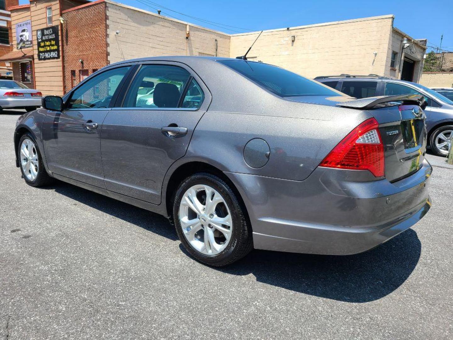 2012 GRAY FORD FUSION SE (3FAHP0HA0CR) with an 2.5L engine, Automatic transmission, located at 117 North Cameron Street, Harrisburg, PA, 17101, (717) 963-8962, 40.266762, -76.875259 - WE FINANCE!!! Good Credit/ Bad Credit/ No Credit - ALL Trade-Ins Welcomed!!! ***Guaranteed Credit Approval*** APPLY ONLINE or CALL us TODAY ;) Internet Prices and Marketplace Prices are SPECIAL discounted ***CASH DEALS*** Retail Prices are higher. Please call us to discuss your cash and finan - Photo#2