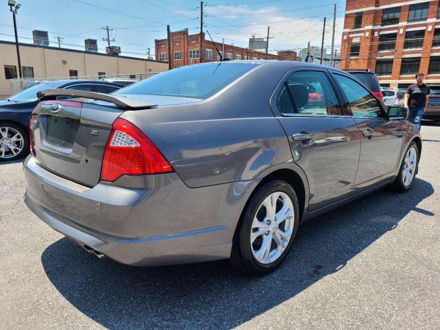 2012 GRAY FORD FUSION SE (3FAHP0HA0CR) with an 2.5L engine, Automatic transmission, located at 117 North Cameron Street, Harrisburg, PA, 17101, (717) 963-8962, 40.266762, -76.875259 - WE FINANCE!!! Good Credit/ Bad Credit/ No Credit - ALL Trade-Ins Welcomed!!! ***Guaranteed Credit Approval*** APPLY ONLINE or CALL us TODAY ;) Internet Prices and Marketplace Prices are SPECIAL discounted ***CASH DEALS*** Retail Prices are higher. Please call us to discuss your cash and finan - Photo#4