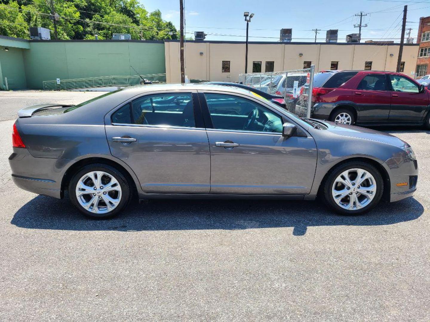 2012 GRAY FORD FUSION SE (3FAHP0HA0CR) with an 2.5L engine, Automatic transmission, located at 117 North Cameron Street, Harrisburg, PA, 17101, (717) 963-8962, 40.266762, -76.875259 - WE FINANCE!!! Good Credit/ Bad Credit/ No Credit - ALL Trade-Ins Welcomed!!! ***Guaranteed Credit Approval*** APPLY ONLINE or CALL us TODAY ;) Internet Prices and Marketplace Prices are SPECIAL discounted ***CASH DEALS*** Retail Prices are higher. Please call us to discuss your cash and finan - Photo#5