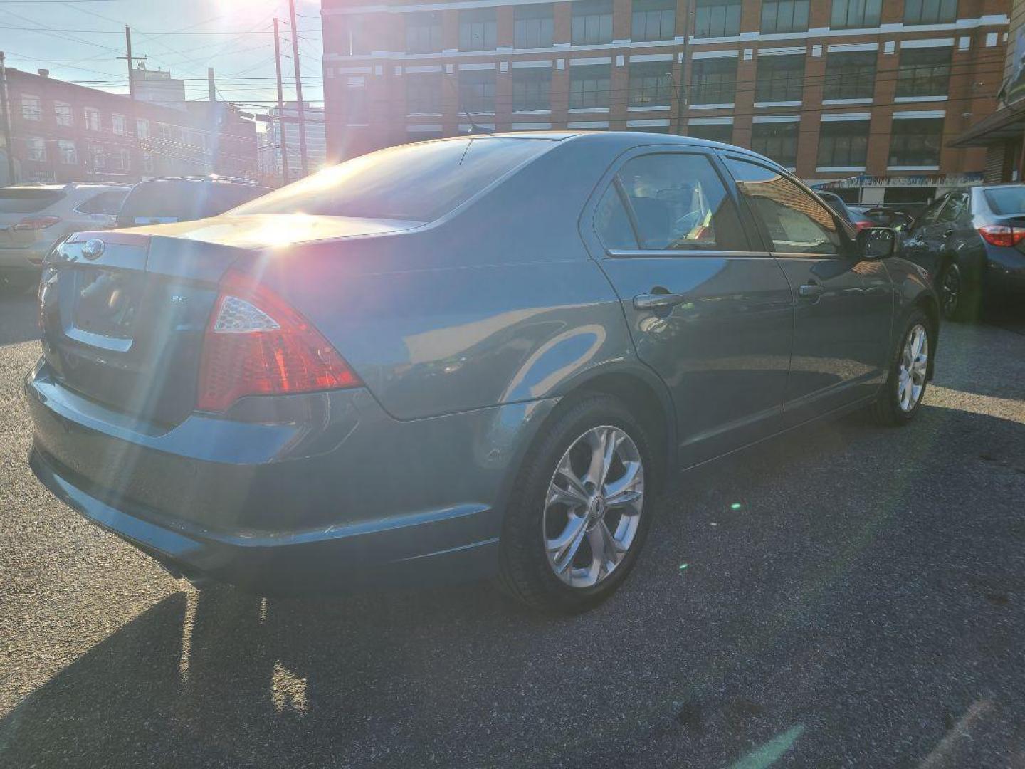 2012 BLUE FORD FUSION SE (3FAHP0HA1CR) with an 2.5L engine, Automatic transmission, located at 117 North Cameron Street, Harrisburg, PA, 17101, (717) 963-8962, 40.266762, -76.875259 - WE FINANCE!!! Good Credit/ Bad Credit/ No Credit - ALL Trade-Ins Welcomed!!! ***Guaranteed Credit Approval*** APPLY ONLINE or CALL us TODAY ;) Internet Prices and Marketplace Prices are SPECIAL discounted ***CASH DEALS*** Retail Prices are higher. Please call us to discuss your cash and finan - Photo#4