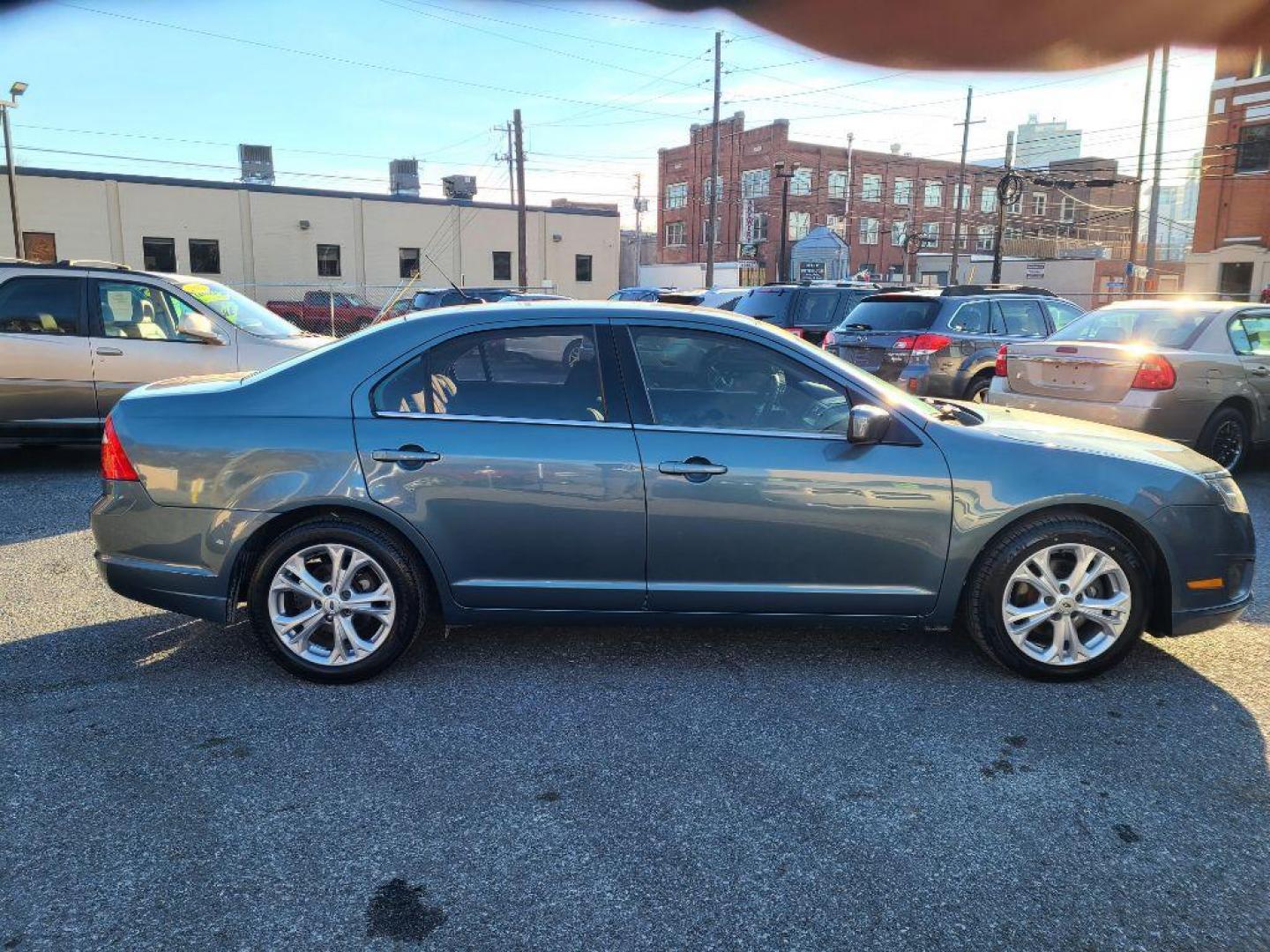 2012 BLUE FORD FUSION SE (3FAHP0HA1CR) with an 2.5L engine, Automatic transmission, located at 117 North Cameron Street, Harrisburg, PA, 17101, (717) 963-8962, 40.266762, -76.875259 - WE FINANCE!!! Good Credit/ Bad Credit/ No Credit - ALL Trade-Ins Welcomed!!! ***Guaranteed Credit Approval*** APPLY ONLINE or CALL us TODAY ;) Internet Prices and Marketplace Prices are SPECIAL discounted ***CASH DEALS*** Retail Prices are higher. Please call us to discuss your cash and finan - Photo#5