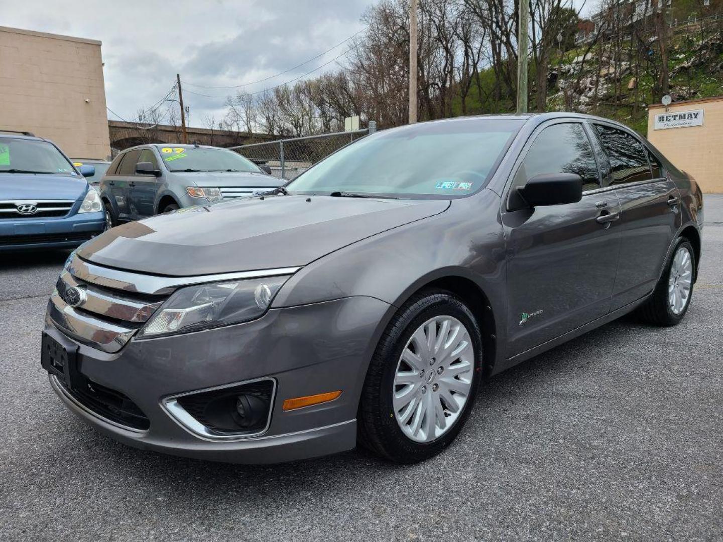 2012 GRAY FORD FUSION HYBRID (3FADP0L31CR) with an 2.5L engine, Continuously Variable transmission, located at 117 North Cameron Street, Harrisburg, PA, 17101, (717) 963-8962, 40.266762, -76.875259 - WE FINANCE!!! Good Credit/ Bad Credit/ No Credit - ALL Trade-Ins Welcomed!!! ***Guaranteed Credit Approval*** APPLY ONLINE or CALL us TODAY ;) Internet Prices and Marketplace Prices are SPECIAL discounted ***CASH DEALS*** Retail Prices are higher. Please call us to discuss your cash and finan - Photo#0