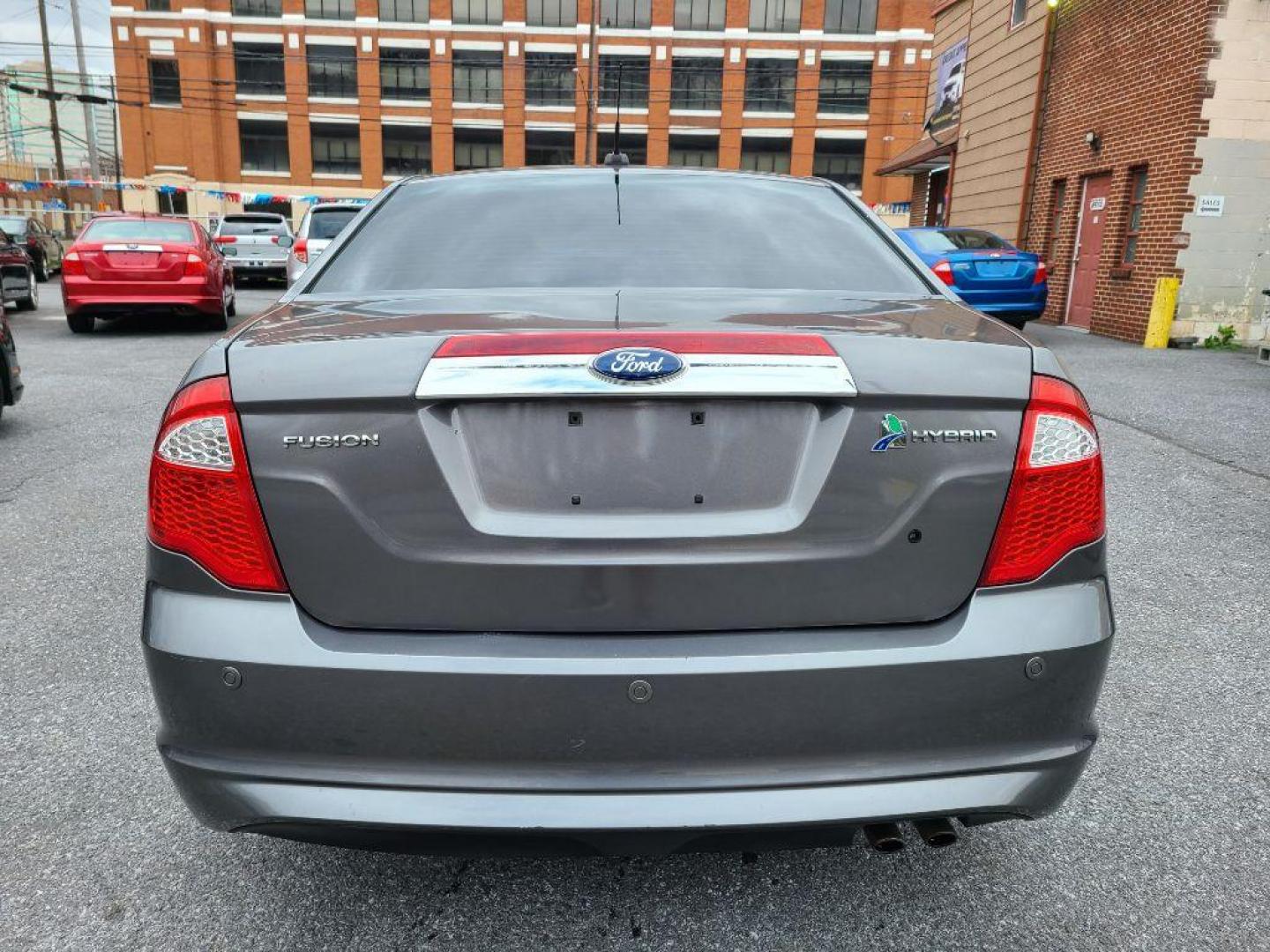 2012 GRAY FORD FUSION HYBRID (3FADP0L31CR) with an 2.5L engine, Continuously Variable transmission, located at 117 North Cameron Street, Harrisburg, PA, 17101, (717) 963-8962, 40.266762, -76.875259 - WE FINANCE!!! Good Credit/ Bad Credit/ No Credit - ALL Trade-Ins Welcomed!!! ***Guaranteed Credit Approval*** APPLY ONLINE or CALL us TODAY ;) Internet Prices and Marketplace Prices are SPECIAL discounted ***CASH DEALS*** Retail Prices are higher. Please call us to discuss your cash and finan - Photo#3