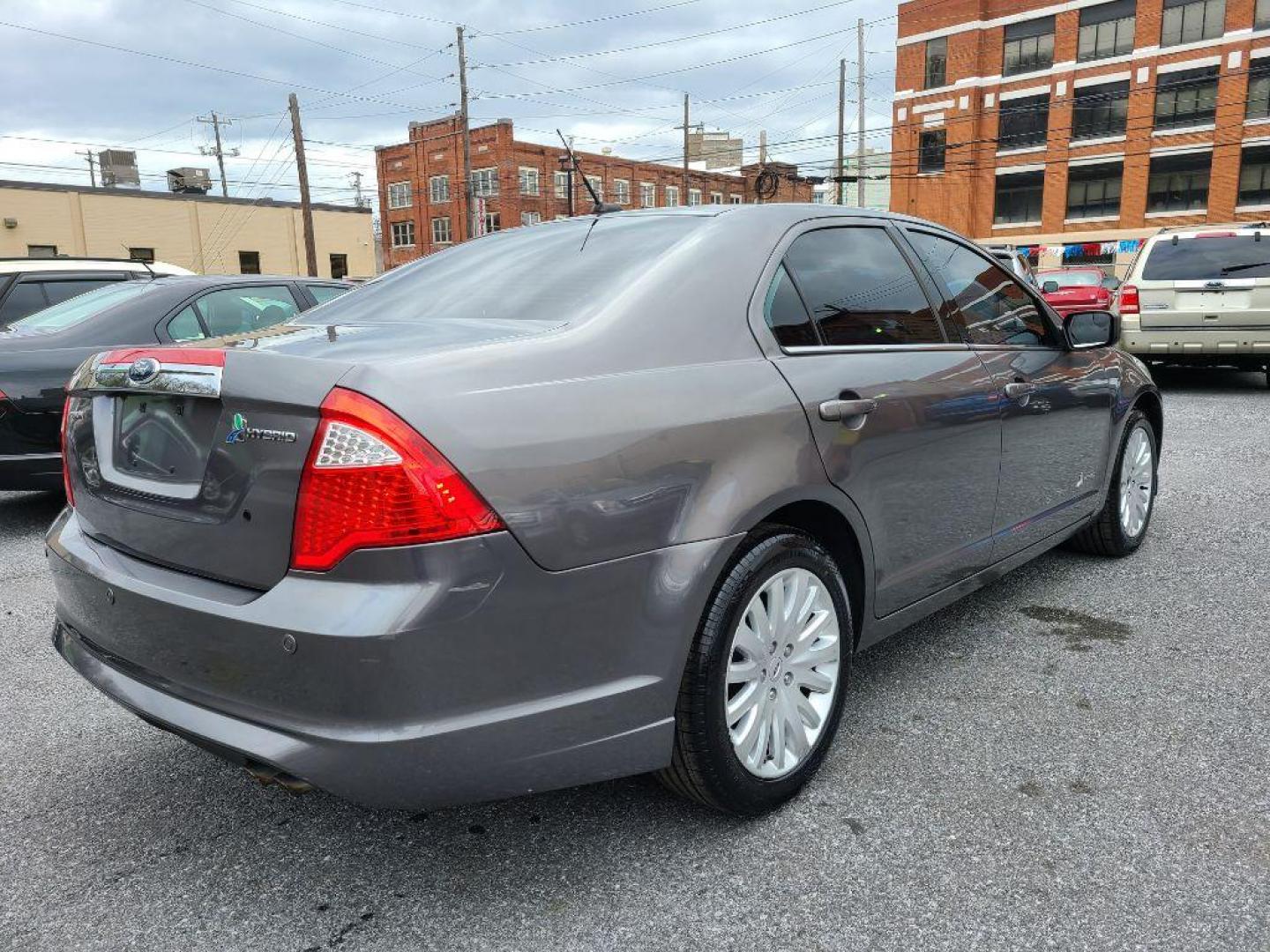 2012 GRAY FORD FUSION HYBRID (3FADP0L31CR) with an 2.5L engine, Continuously Variable transmission, located at 117 North Cameron Street, Harrisburg, PA, 17101, (717) 963-8962, 40.266762, -76.875259 - WE FINANCE!!! Good Credit/ Bad Credit/ No Credit - ALL Trade-Ins Welcomed!!! ***Guaranteed Credit Approval*** APPLY ONLINE or CALL us TODAY ;) Internet Prices and Marketplace Prices are SPECIAL discounted ***CASH DEALS*** Retail Prices are higher. Please call us to discuss your cash and finan - Photo#4