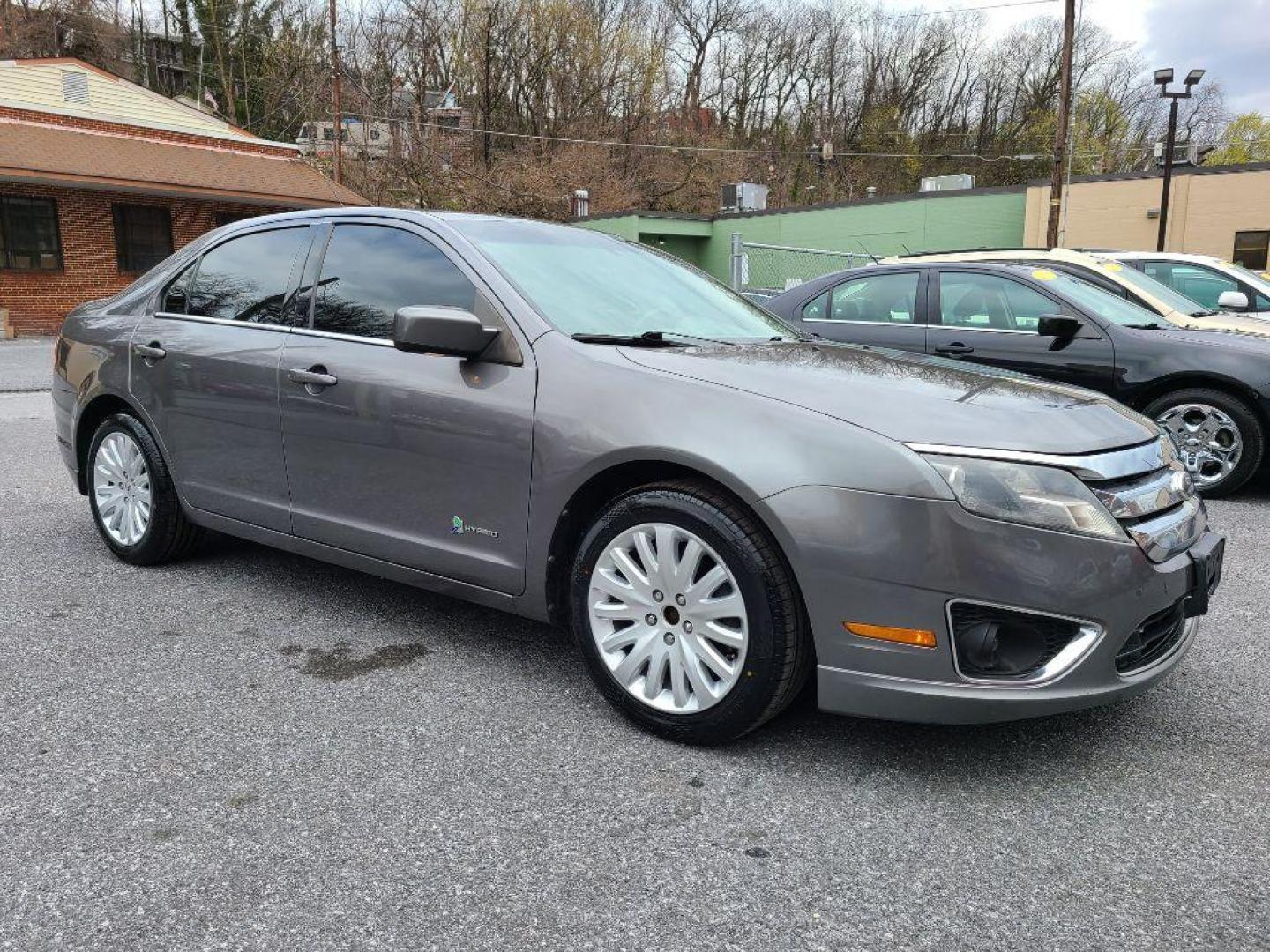 2012 GRAY FORD FUSION HYBRID (3FADP0L31CR) with an 2.5L engine, Continuously Variable transmission, located at 117 North Cameron Street, Harrisburg, PA, 17101, (717) 963-8962, 40.266762, -76.875259 - WE FINANCE!!! Good Credit/ Bad Credit/ No Credit - ALL Trade-Ins Welcomed!!! ***Guaranteed Credit Approval*** APPLY ONLINE or CALL us TODAY ;) Internet Prices and Marketplace Prices are SPECIAL discounted ***CASH DEALS*** Retail Prices are higher. Please call us to discuss your cash and finan - Photo#6