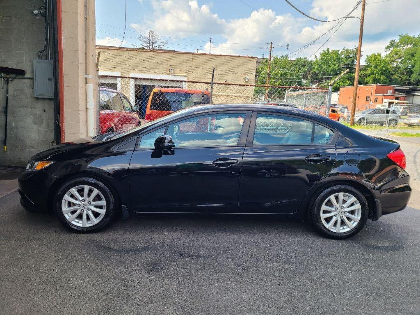 2012 BLACK HONDA CIVIC EX (19XFB2F83CE) with an 1.8L engine, Automatic transmission, located at 7981 Paxton Street, Harrisburg, PA, 17111, (717) 561-2926, 40.261490, -76.749229 - WE FINANCE!!! Good Credit/ Bad Credit/ No Credit - ALL Trade-Ins Welcomed!!! ***Guaranteed Credit Approval*** APPLY ONLINE or CALL us TODAY ;) Internet Prices and Marketplace Prices are SPECIAL discounted ***CASH DEALS*** Retail Prices are higher. Please call us to discuss your cash and finan - Photo#2