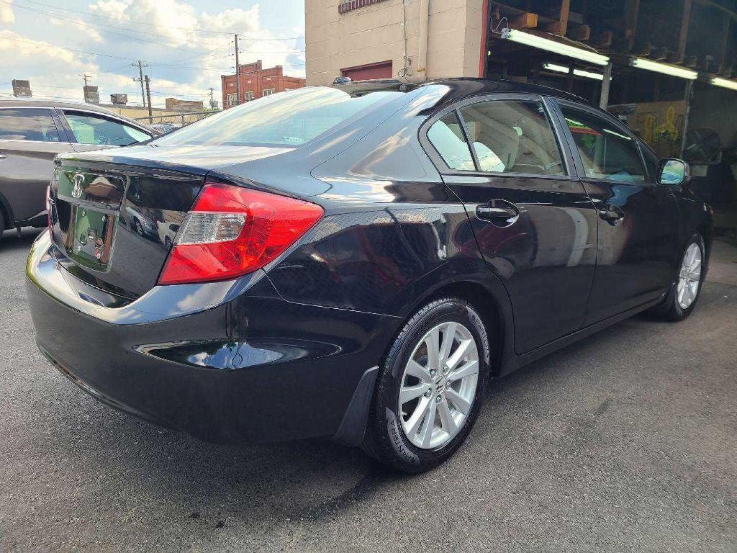 2012 BLACK HONDA CIVIC EX (19XFB2F83CE) with an 1.8L engine, Automatic transmission, located at 7981 Paxton Street, Harrisburg, PA, 17111, (717) 561-2926, 40.261490, -76.749229 - WE FINANCE!!! Good Credit/ Bad Credit/ No Credit - ALL Trade-Ins Welcomed!!! ***Guaranteed Credit Approval*** APPLY ONLINE or CALL us TODAY ;) Internet Prices and Marketplace Prices are SPECIAL discounted ***CASH DEALS*** Retail Prices are higher. Please call us to discuss your cash and finan - Photo#5