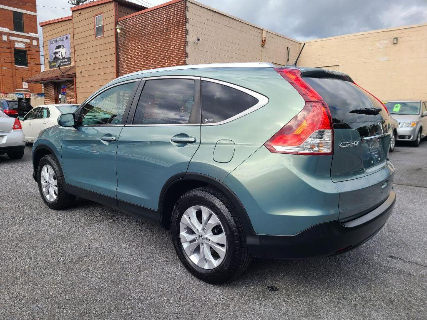 2012 GREEN HONDA CR-V EXL (2HKRM4H70CH) with an 2.4L engine, Automatic transmission, located at 7981 Paxton Street, Harrisburg, PA, 17111, (717) 561-2926, 40.261490, -76.749229 - WE FINANCE!!! Good Credit/ Bad Credit/ No Credit - ALL Trade-Ins Welcomed!!! ***Guaranteed Credit Approval*** APPLY ONLINE or CALL us TODAY ;) Internet Prices and Marketplace Prices are SPECIAL discounted ***CASH DEALS*** Retail Prices are higher. Please call us to discuss your cash and finan - Photo#2