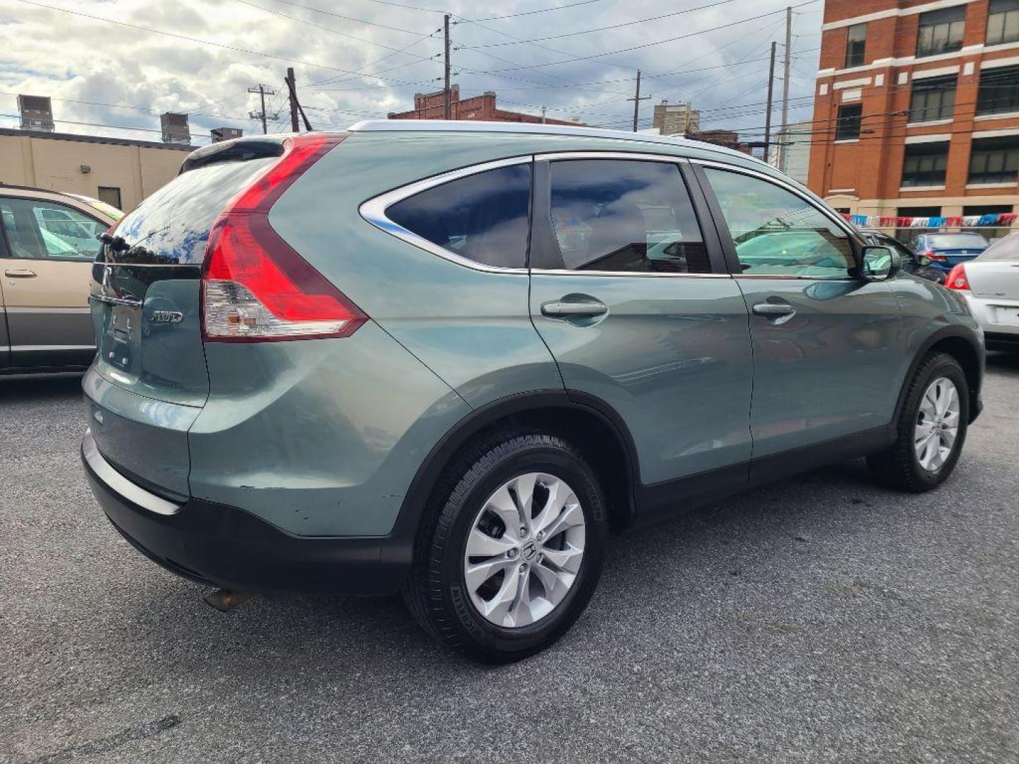 2012 GREEN HONDA CR-V EXL (2HKRM4H70CH) with an 2.4L engine, Automatic transmission, located at 7981 Paxton Street, Harrisburg, PA, 17111, (717) 561-2926, 40.261490, -76.749229 - WE FINANCE!!! Good Credit/ Bad Credit/ No Credit - ALL Trade-Ins Welcomed!!! ***Guaranteed Credit Approval*** APPLY ONLINE or CALL us TODAY ;) Internet Prices and Marketplace Prices are SPECIAL discounted ***CASH DEALS*** Retail Prices are higher. Please call us to discuss your cash and finan - Photo#4