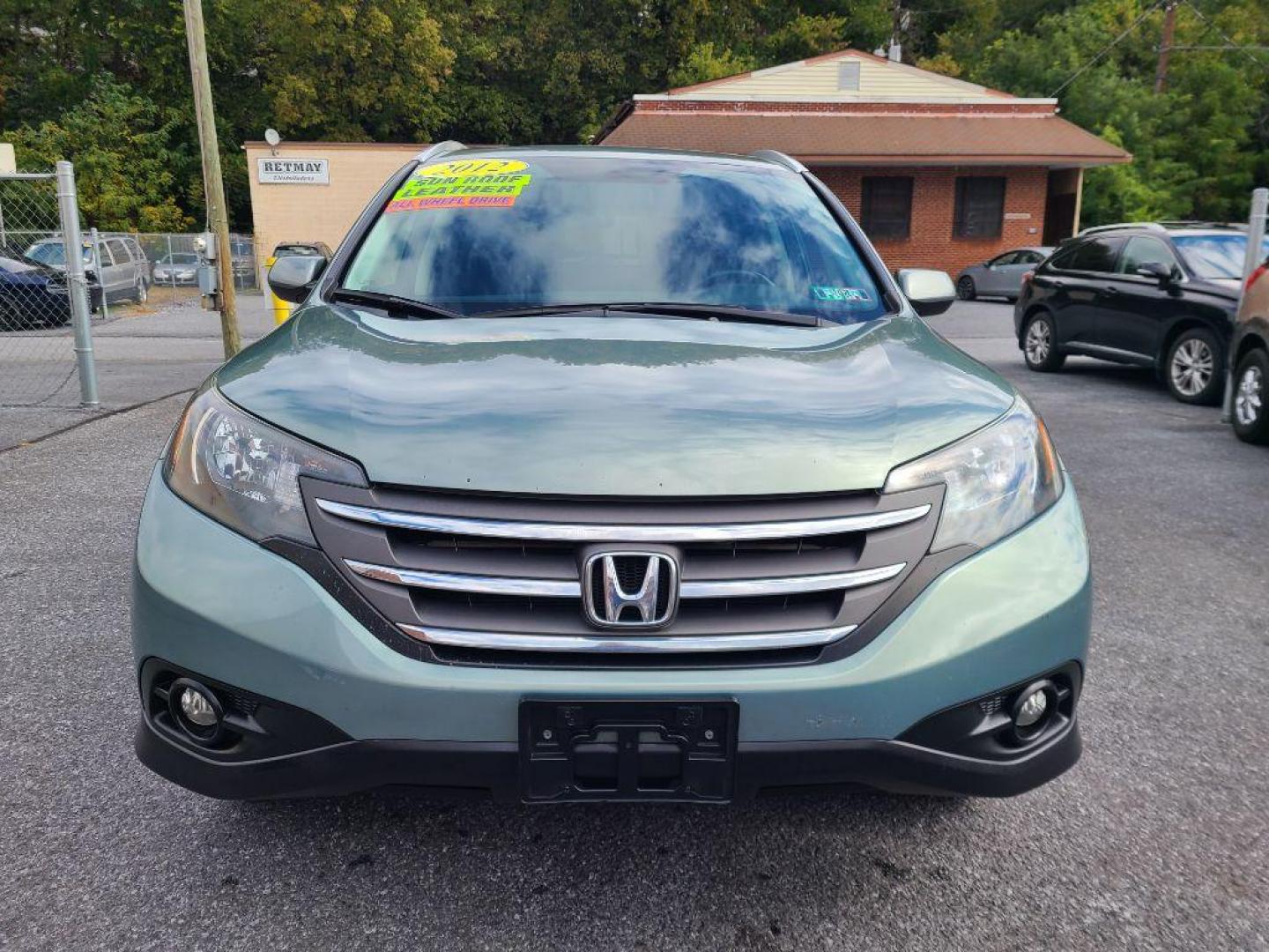 2012 GREEN HONDA CR-V EXL (2HKRM4H70CH) with an 2.4L engine, Automatic transmission, located at 7981 Paxton Street, Harrisburg, PA, 17111, (717) 561-2926, 40.261490, -76.749229 - WE FINANCE!!! Good Credit/ Bad Credit/ No Credit - ALL Trade-Ins Welcomed!!! ***Guaranteed Credit Approval*** APPLY ONLINE or CALL us TODAY ;) Internet Prices and Marketplace Prices are SPECIAL discounted ***CASH DEALS*** Retail Prices are higher. Please call us to discuss your cash and finan - Photo#7