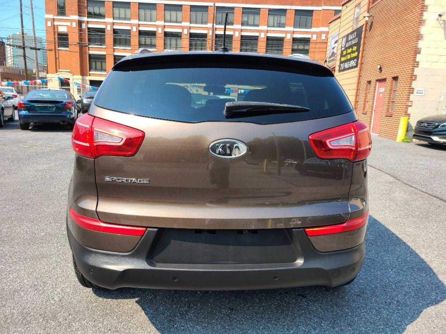 2012 BROWN KIA SPORTAGE LX (KNDPB3A26C7) with an 2.4L engine, Automatic transmission, located at 117 North Cameron Street, Harrisburg, PA, 17101, (717) 963-8962, 40.266762, -76.875259 - WE FINANCE!!! Good Credit/ Bad Credit/ No Credit - ALL Trade-Ins Welcomed!!! ***Guaranteed Credit Approval*** APPLY ONLINE or CALL us TODAY ;) Internet Prices and Marketplace Prices are SPECIAL discounted ***CASH DEALS*** Retail Prices are higher. Please call us to discuss your cash and finan - Photo#3