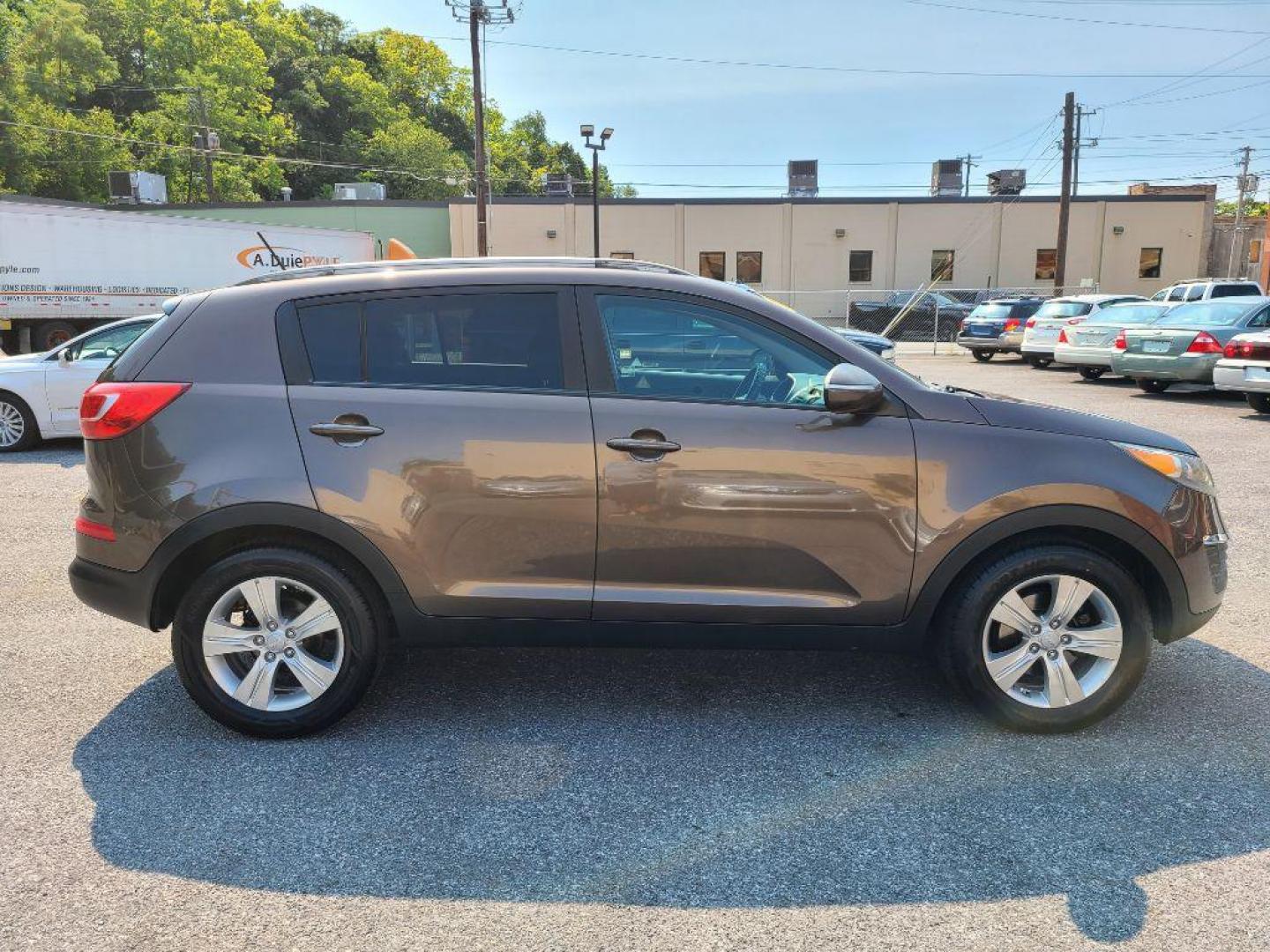 2012 BROWN KIA SPORTAGE LX (KNDPB3A26C7) with an 2.4L engine, Automatic transmission, located at 117 North Cameron Street, Harrisburg, PA, 17101, (717) 963-8962, 40.266762, -76.875259 - WE FINANCE!!! Good Credit/ Bad Credit/ No Credit - ALL Trade-Ins Welcomed!!! ***Guaranteed Credit Approval*** APPLY ONLINE or CALL us TODAY ;) Internet Prices and Marketplace Prices are SPECIAL discounted ***CASH DEALS*** Retail Prices are higher. Please call us to discuss your cash and finan - Photo#5