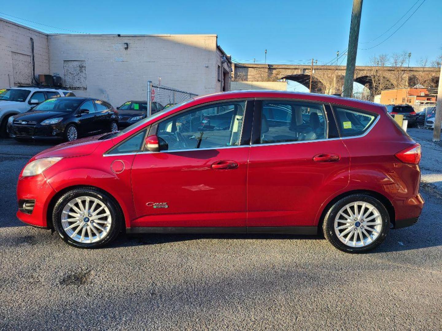 2013 RED FORD C-MAX ENERGI PREMIUM SEL (1FADP5CU9DL) with an 2.0L engine, Continuously Variable transmission, located at 7981 Paxton Street, Harrisburg, PA, 17111, (717) 561-2926, 40.261490, -76.749229 - WE FINANCE!!! Good Credit/ Bad Credit/ No Credit - ALL Trade-Ins Welcomed!!! ***Guaranteed Credit Approval*** APPLY ONLINE or CALL us TODAY ;) Internet Prices and Marketplace Prices are SPECIAL discounted ***CASH DEALS*** Retail Prices are higher. Please call us to discuss your cash and finan - Photo#1